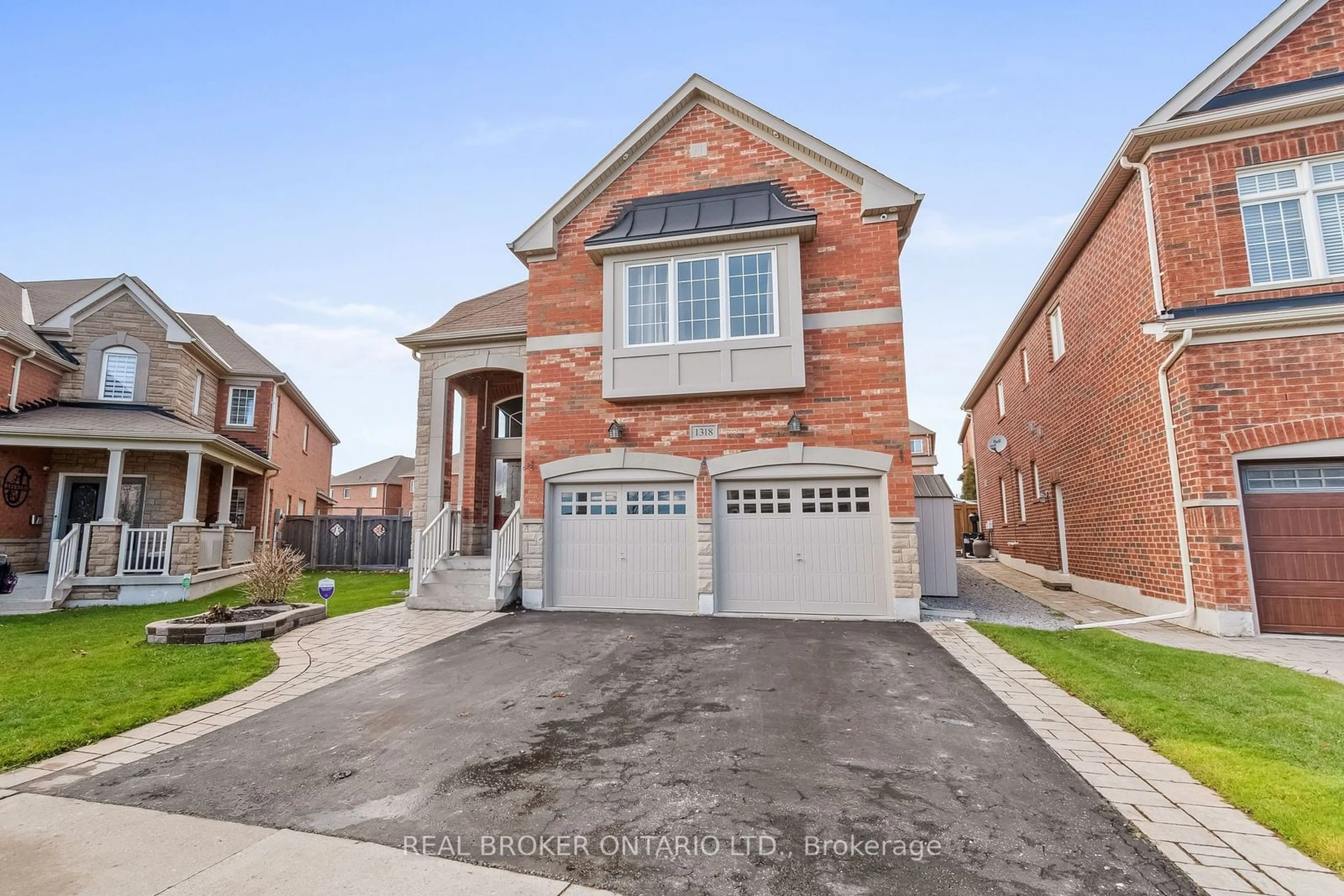 Home with brick exterior material, street for 1318 Harlstone Cres, Oshawa Ontario L1K 0N5