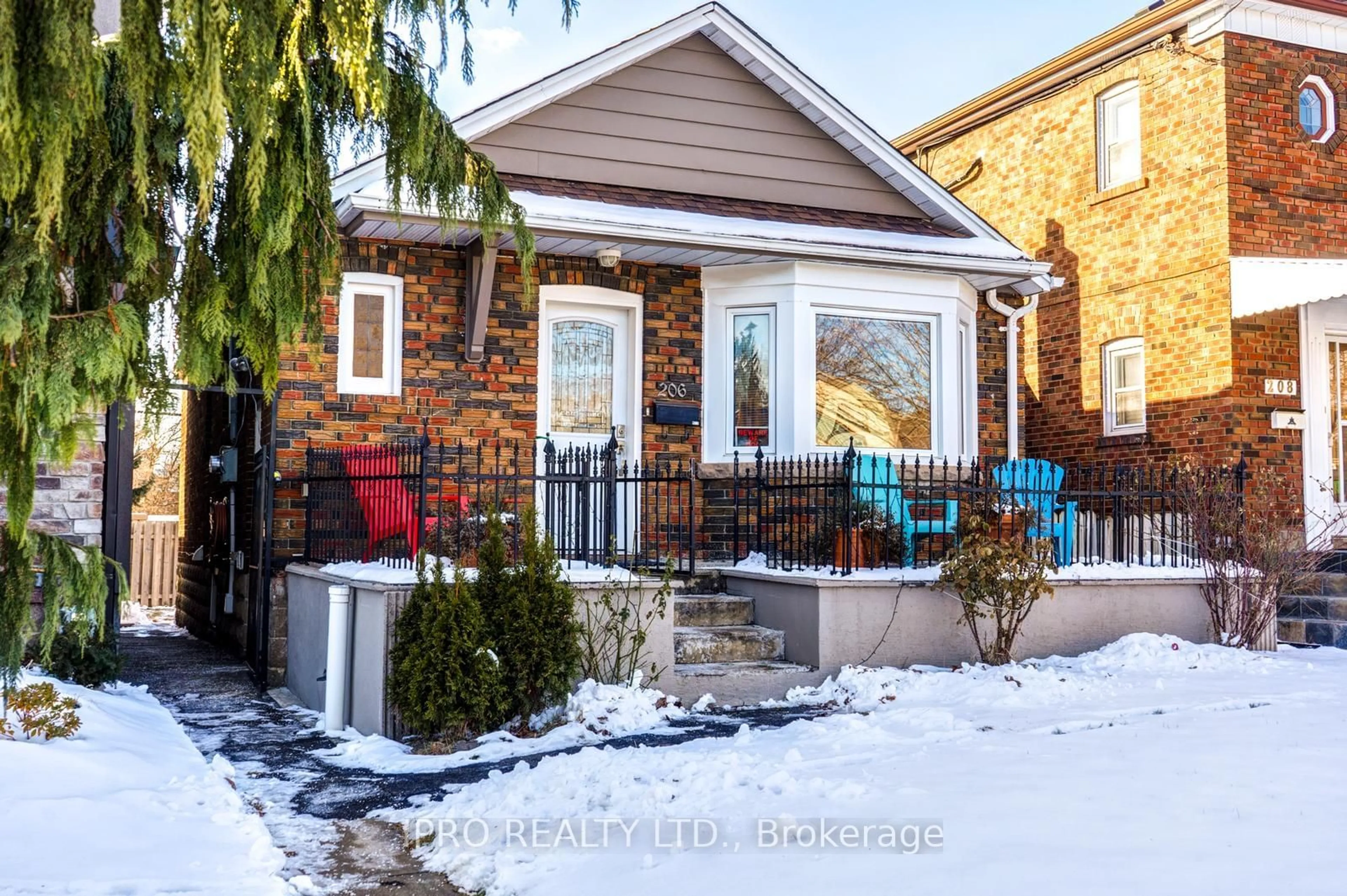 Home with brick exterior material, street for 206 Donlands Ave, Toronto Ontario M4J 3R1