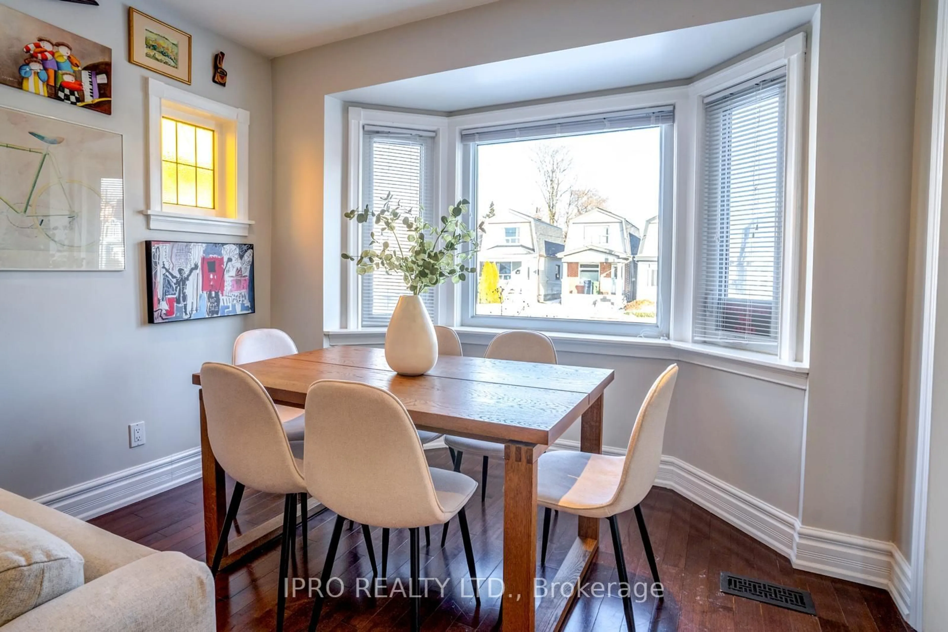 Dining room, wood/laminate floor for 206 Donlands Ave, Toronto Ontario M4J 3R1