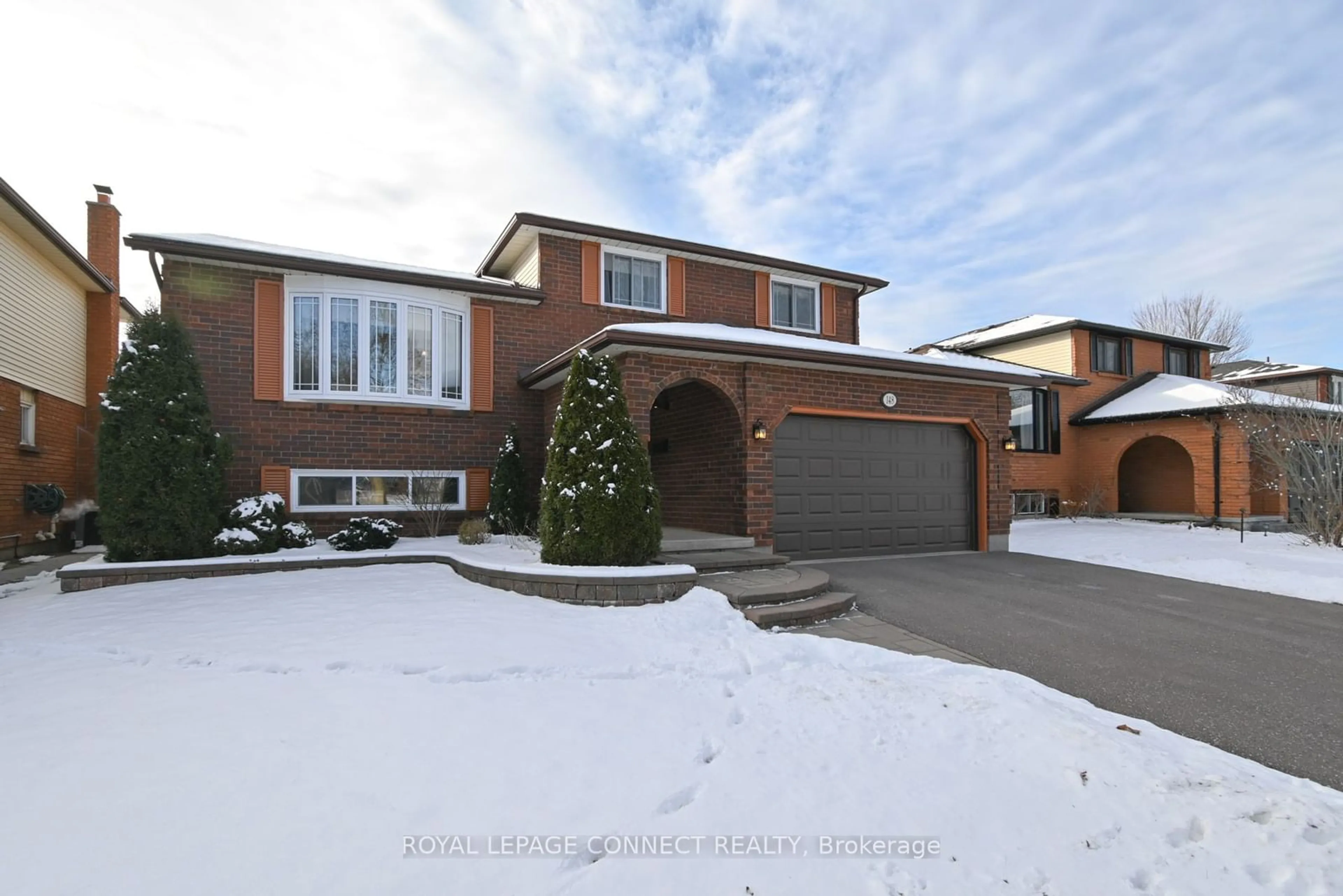 Home with brick exterior material, street for 148 Centerfield Dr, Clarington Ontario L1E 1M1