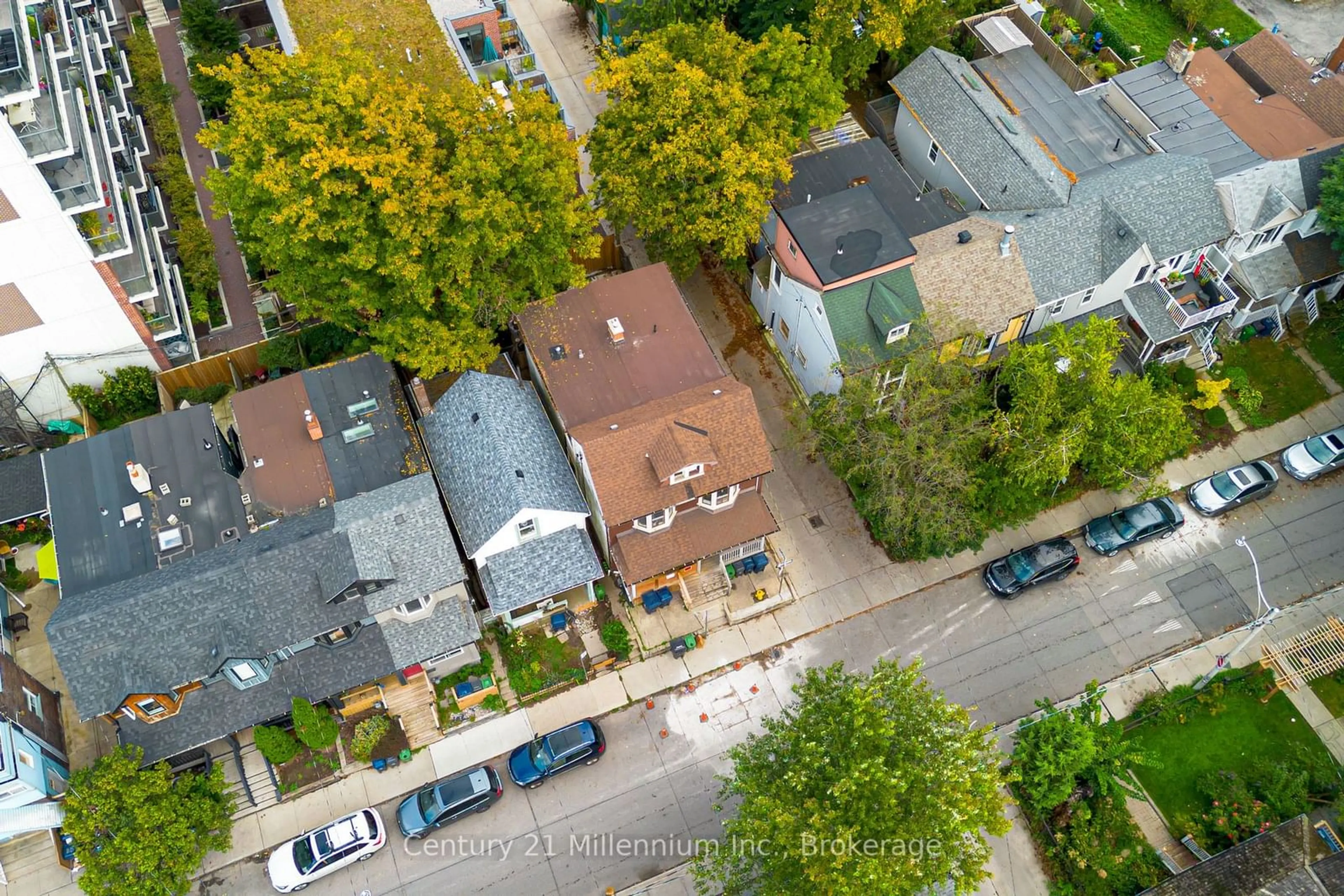 A pic from outside/outdoor area/front of a property/back of a property/a pic from drone, street for 69 Laing St, Toronto Ontario M4L 2N4