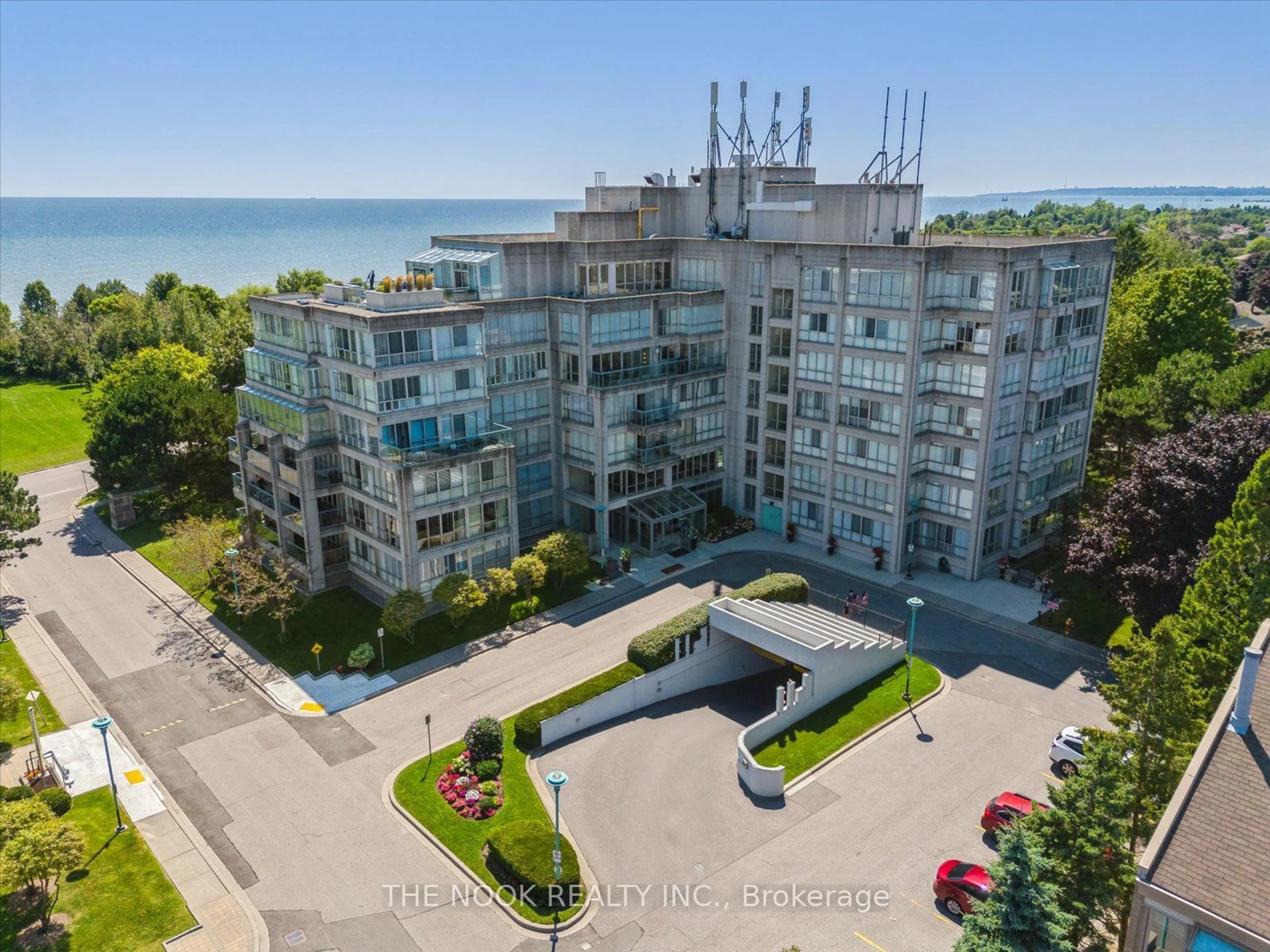 A pic from outside/outdoor area/front of a property/back of a property/a pic from drone, water/lake/river/ocean view for 70 Cumberland Lane #309, Ajax Ontario L1S 7K2