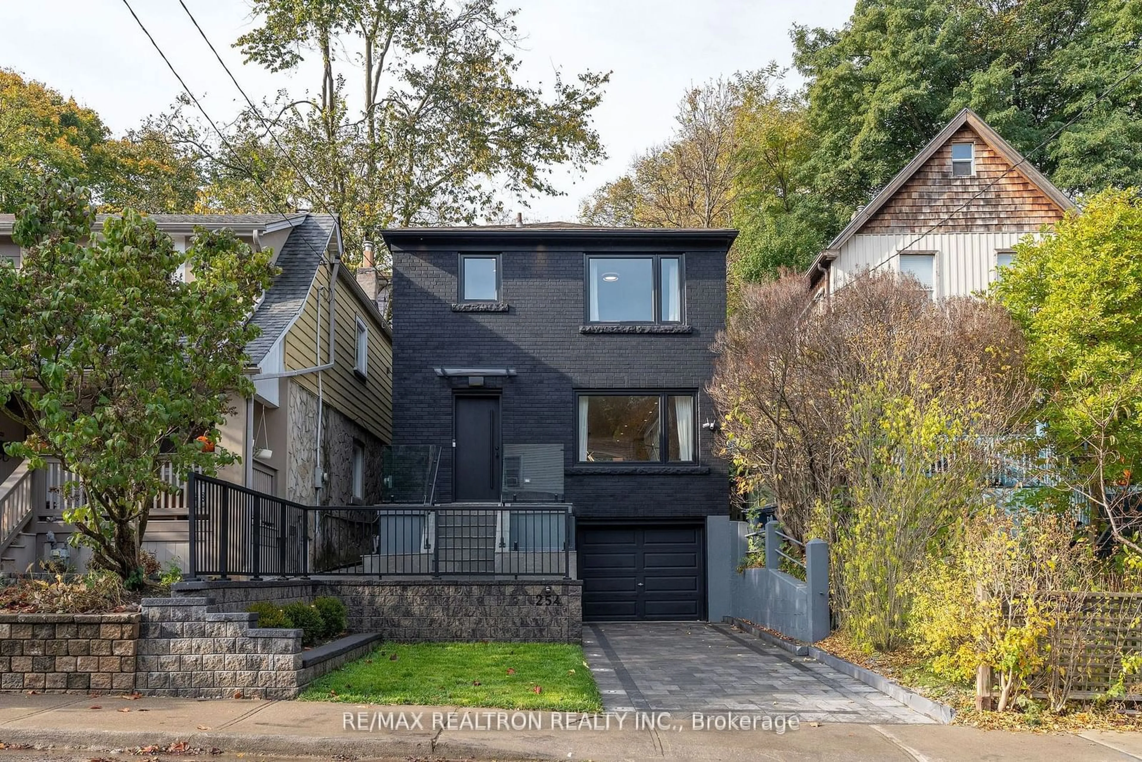 Home with brick exterior material, street for 254 Hastings Ave, Toronto Ontario M4L 2M1