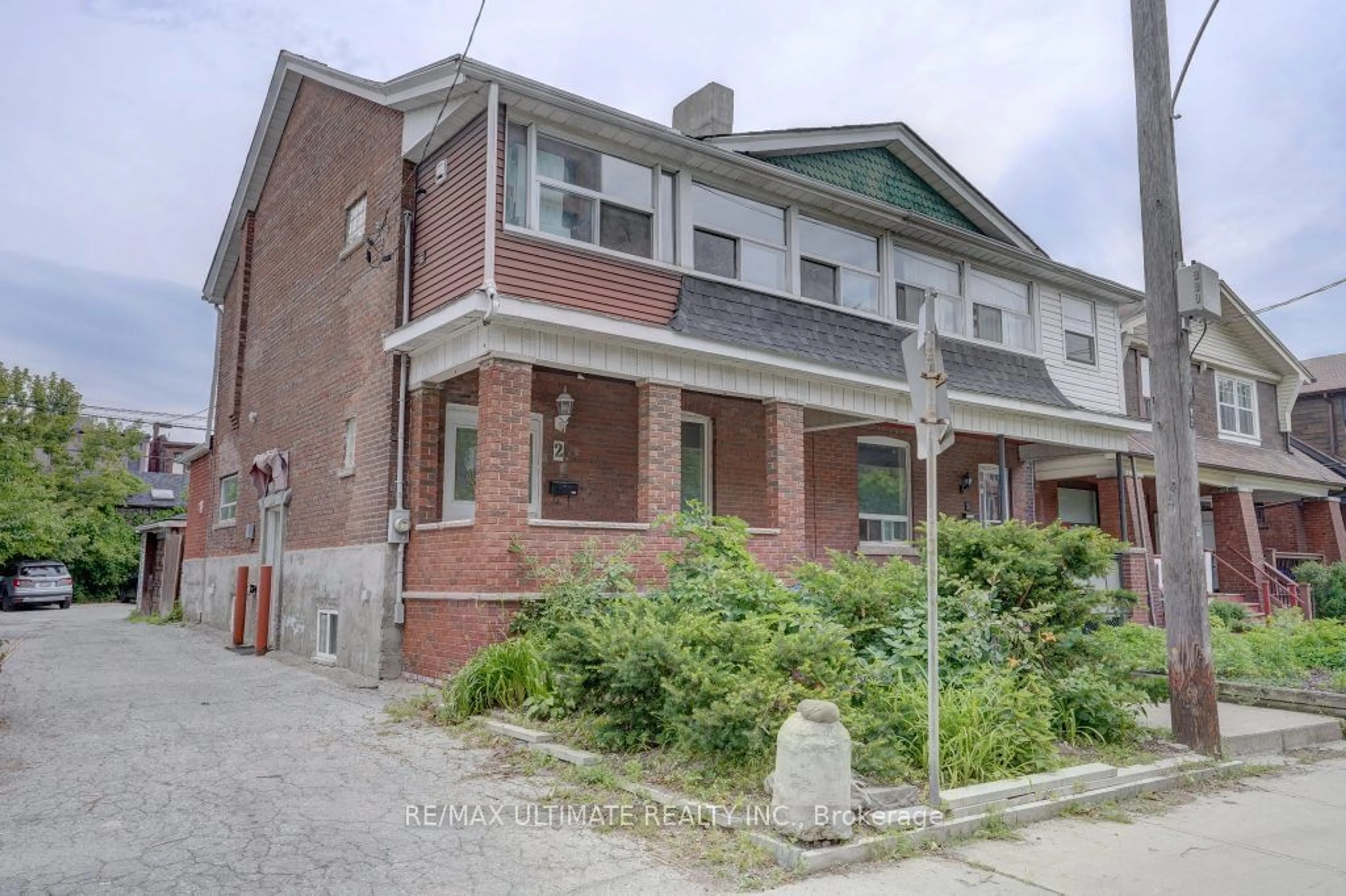 Home with brick exterior material, street for 2 Dearbourne Ave, Toronto Ontario M4K 1M7