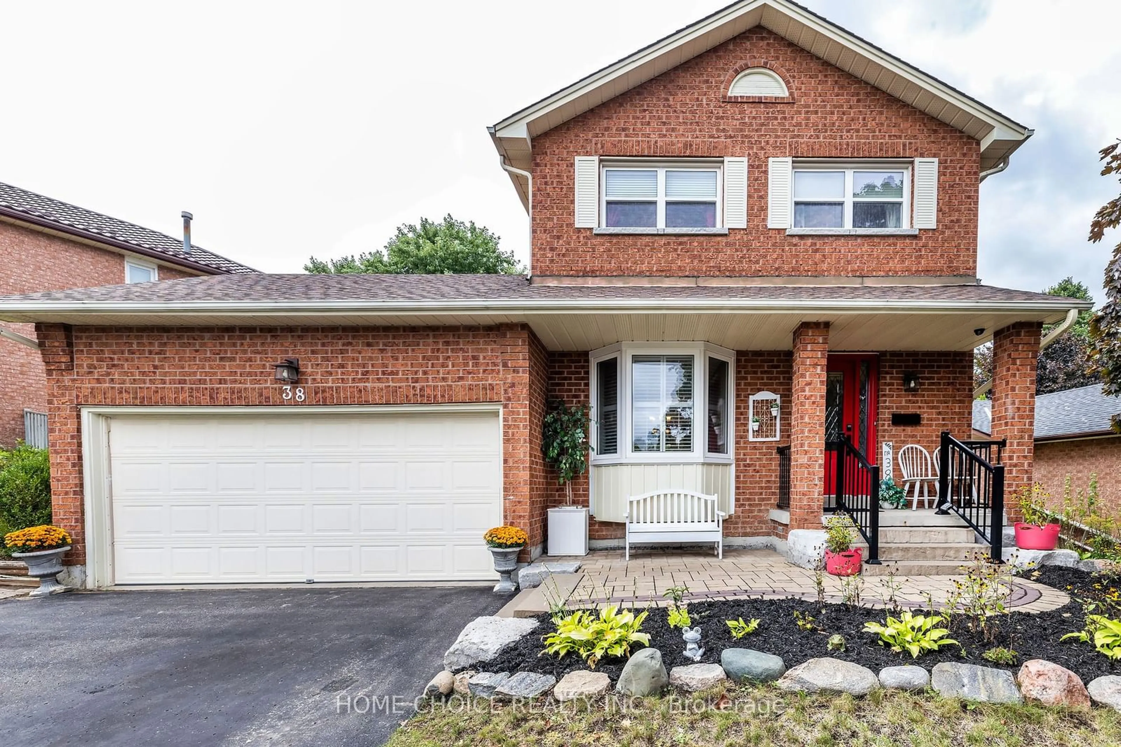 Home with brick exterior material, street for 38 Canadian Oaks Dr, Whitby Ontario L1N 6W8