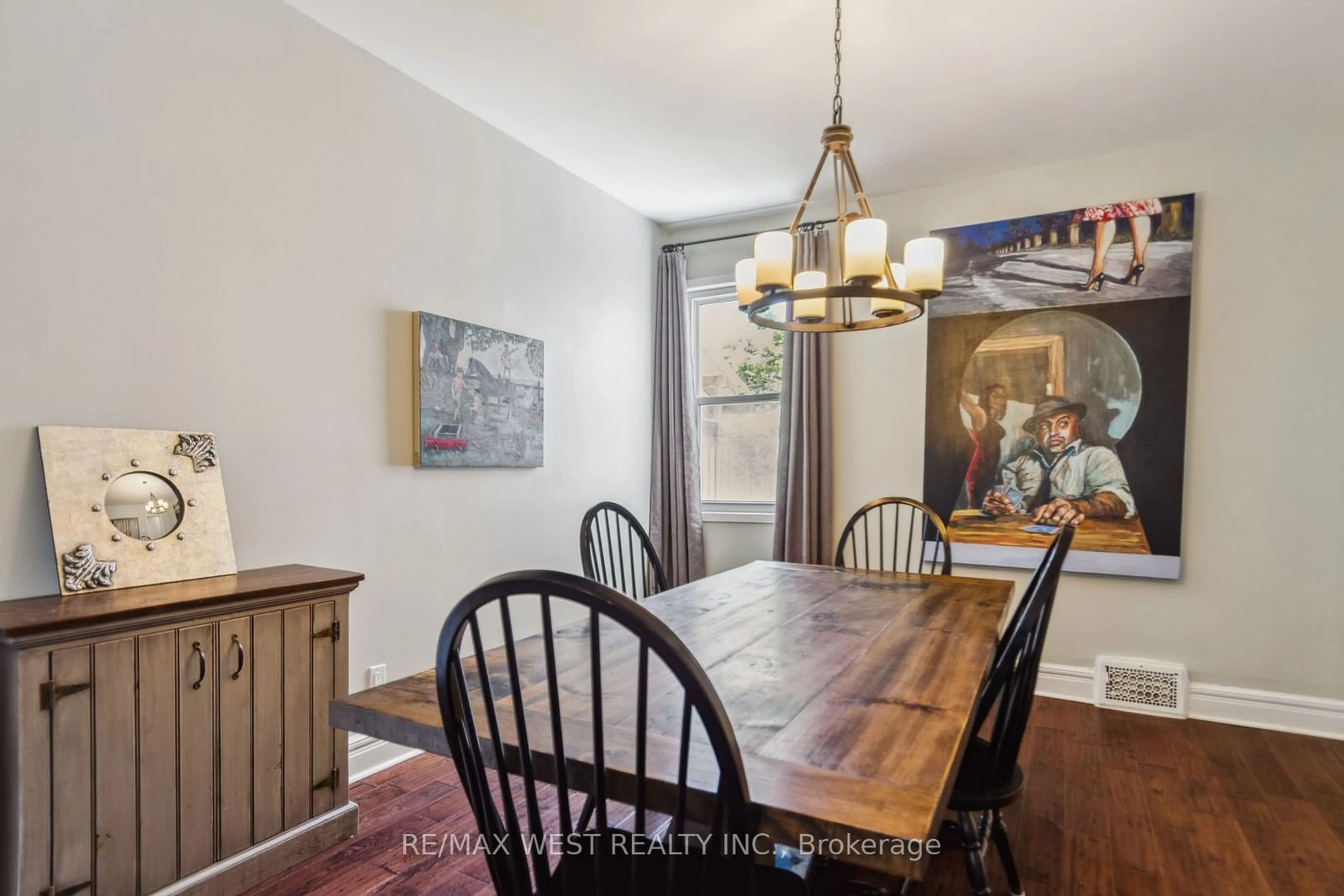 Dining room, wood/laminate floor for 68 Hastings Ave, Toronto Ontario M4L 2L2