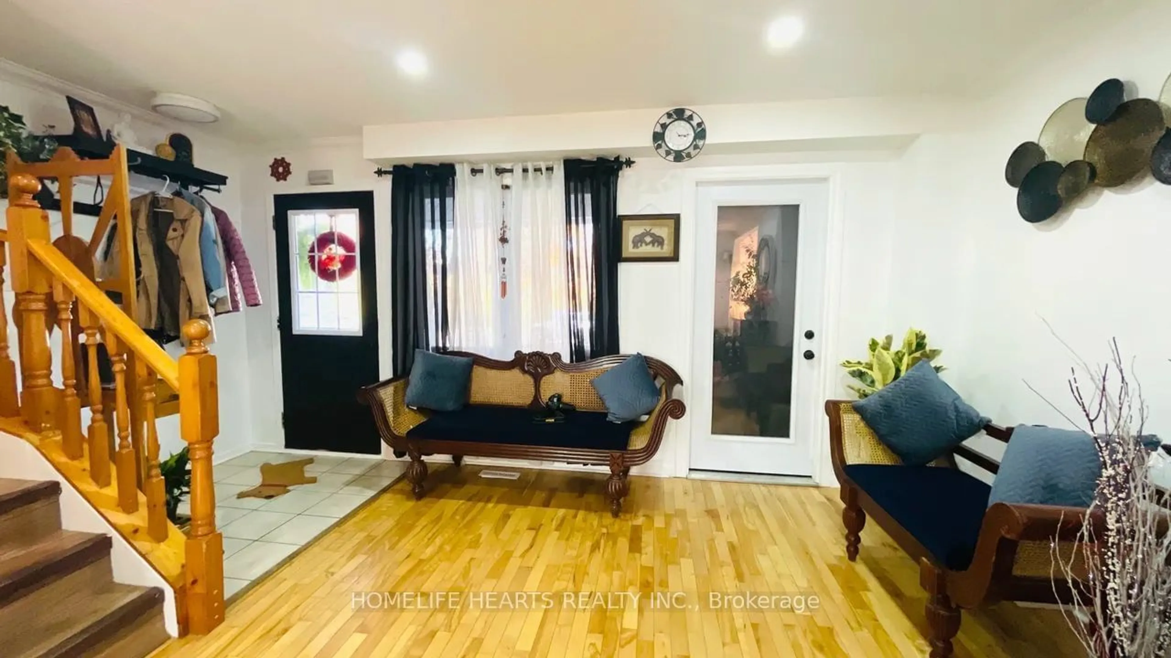 Living room with furniture, wood/laminate floor for 1456 Valley Dr, Oshawa Ontario L1J 7Z3