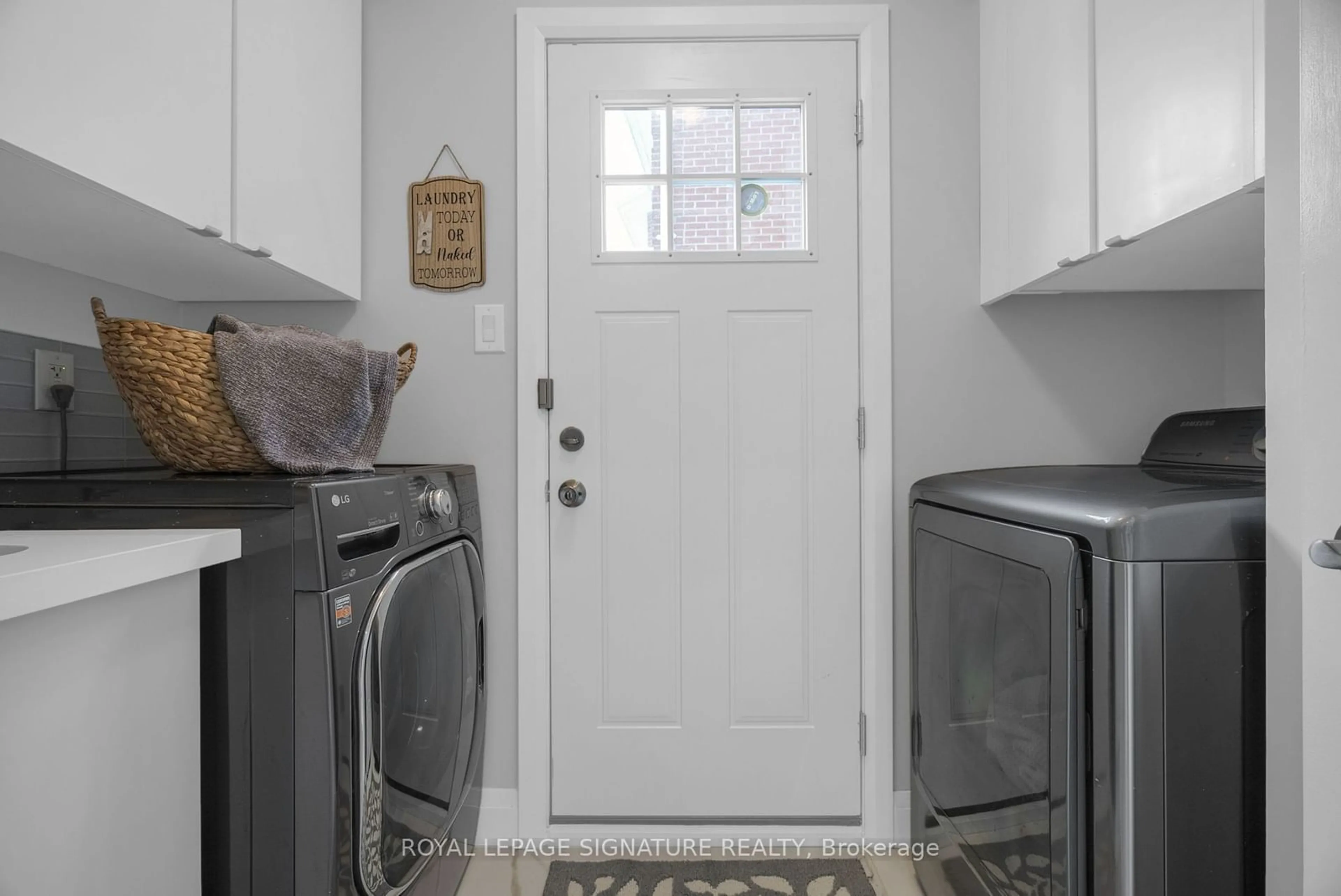 Laundry room for 70 Wyndfield Cres, Whitby Ontario L1N 8L1