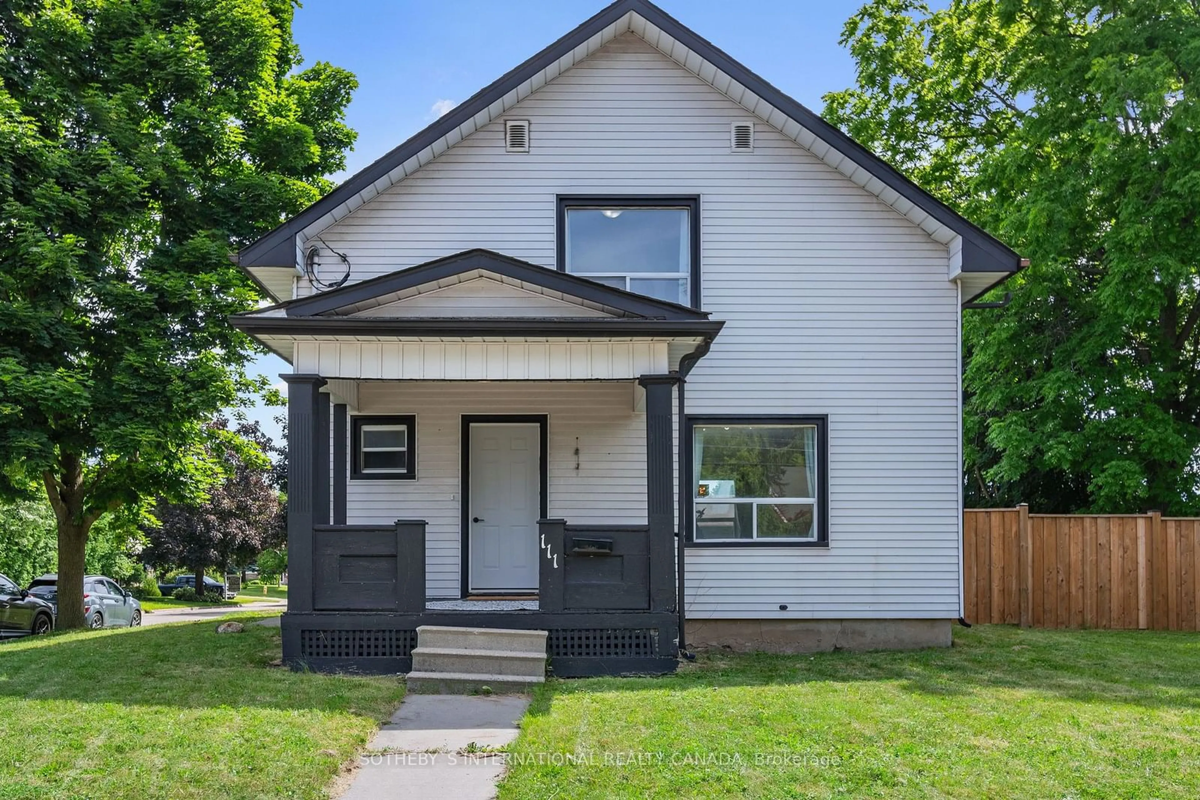 Home with vinyl exterior material, street for 111 Harmony Rd, Oshawa Ontario L1H 6T4