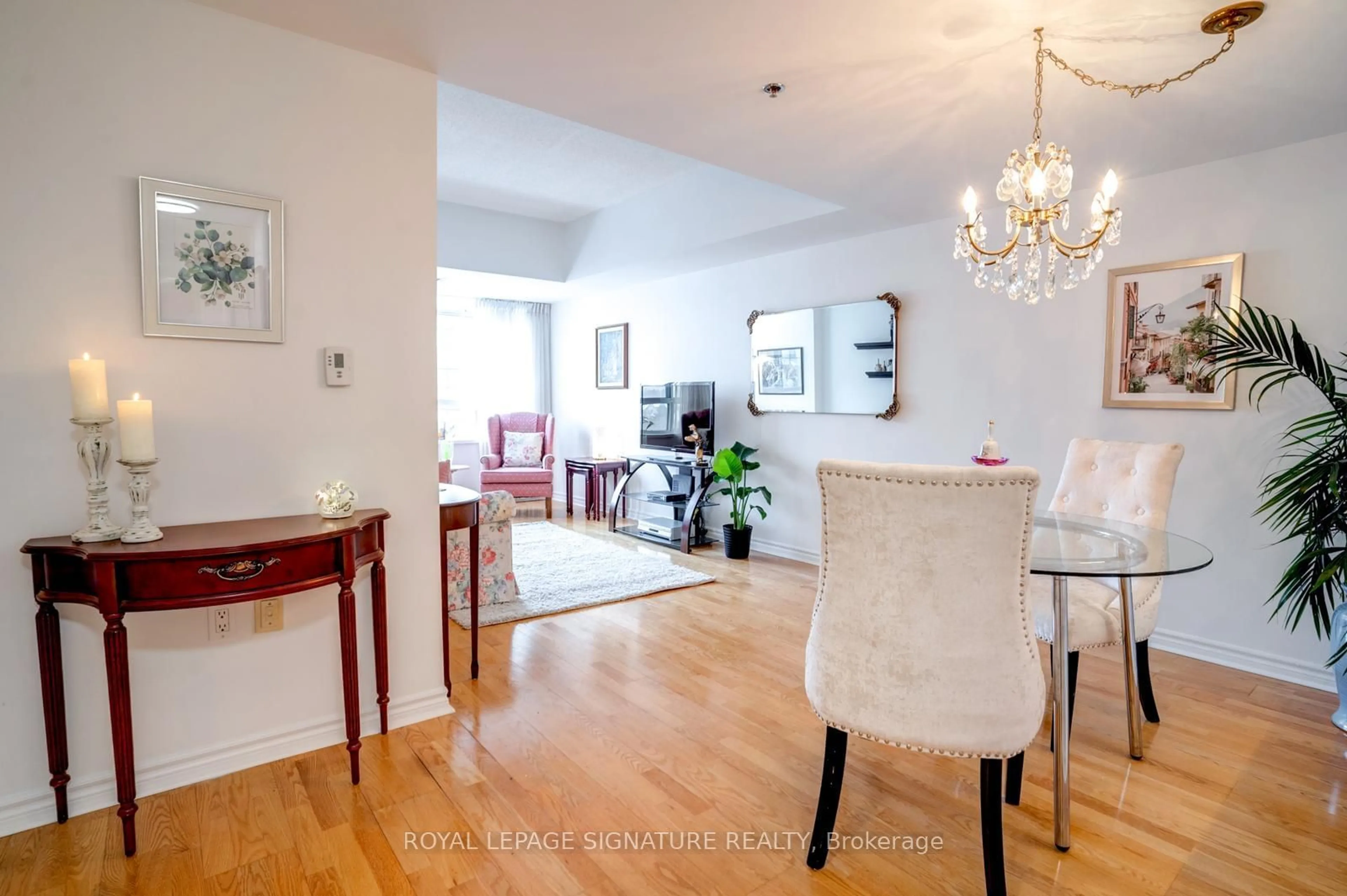 Dining room, wood/laminate floor for 115 Bonis Ave #604, Toronto Ontario M1R 4B2