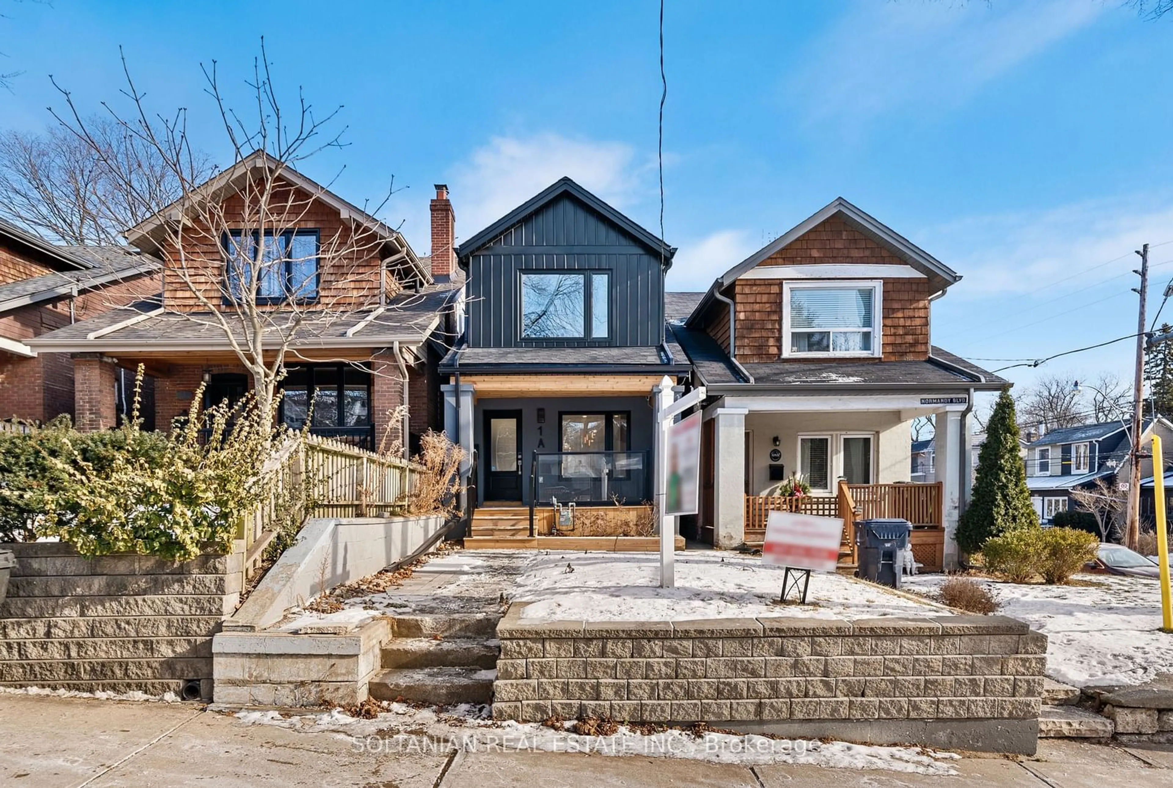 Home with brick exterior material, street for 1A Normandy Blvd, Toronto Ontario M4L 3K1