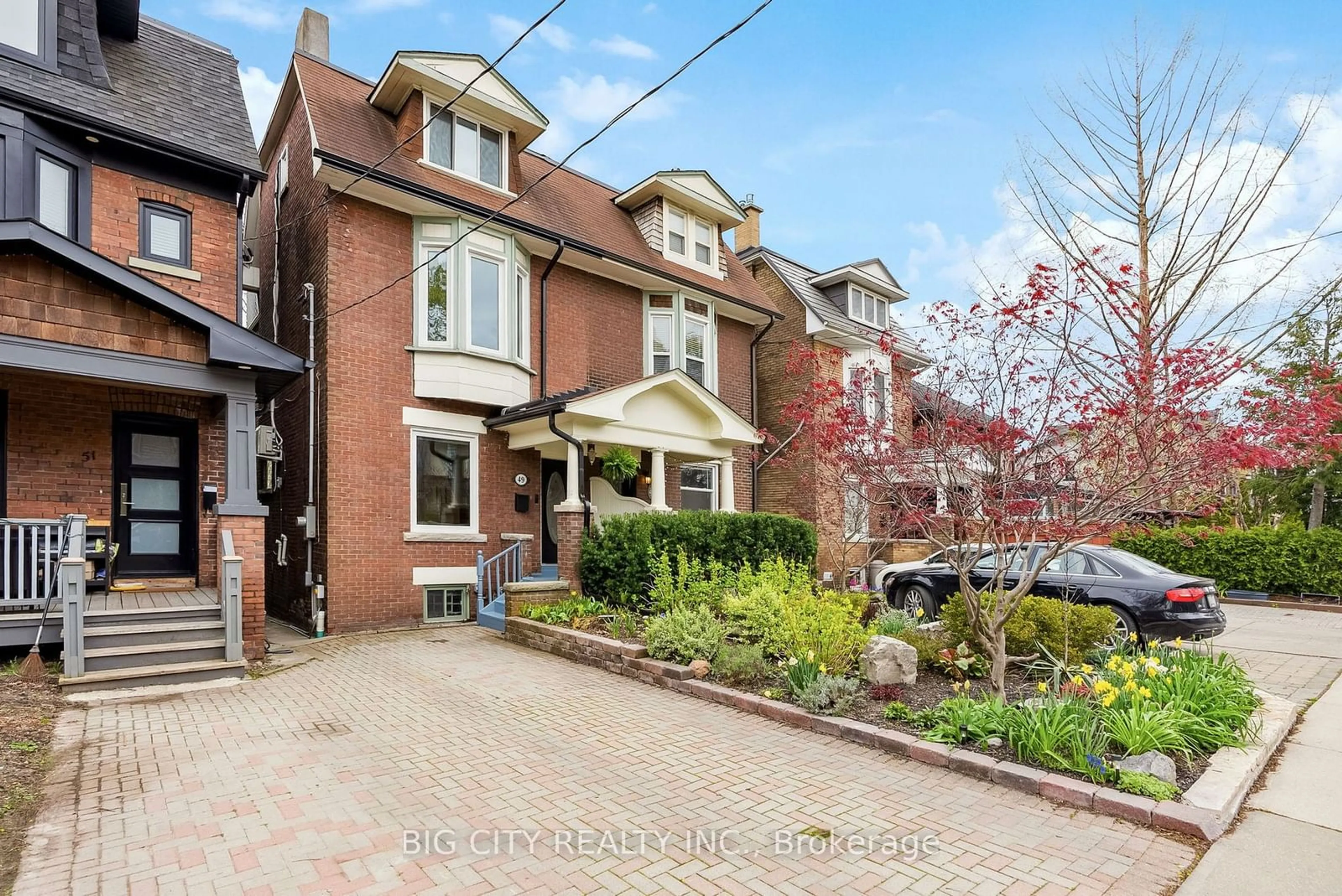 Home with brick exterior material, street for 49 Columbine Ave, Toronto Ontario M4L 1P6