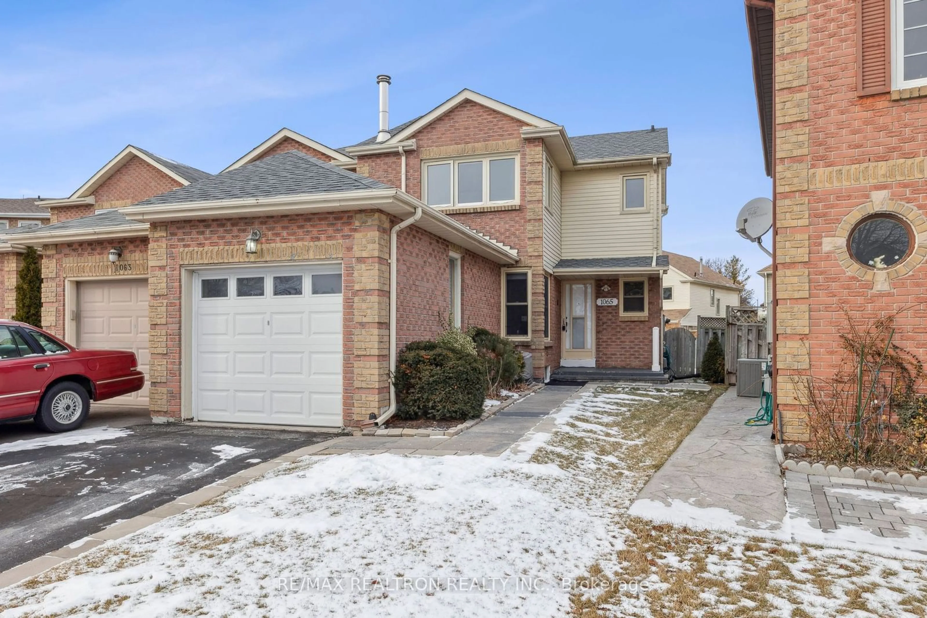 Home with brick exterior material, street for 1065 Rathmore Cres, Pickering Ontario L1V 5A3