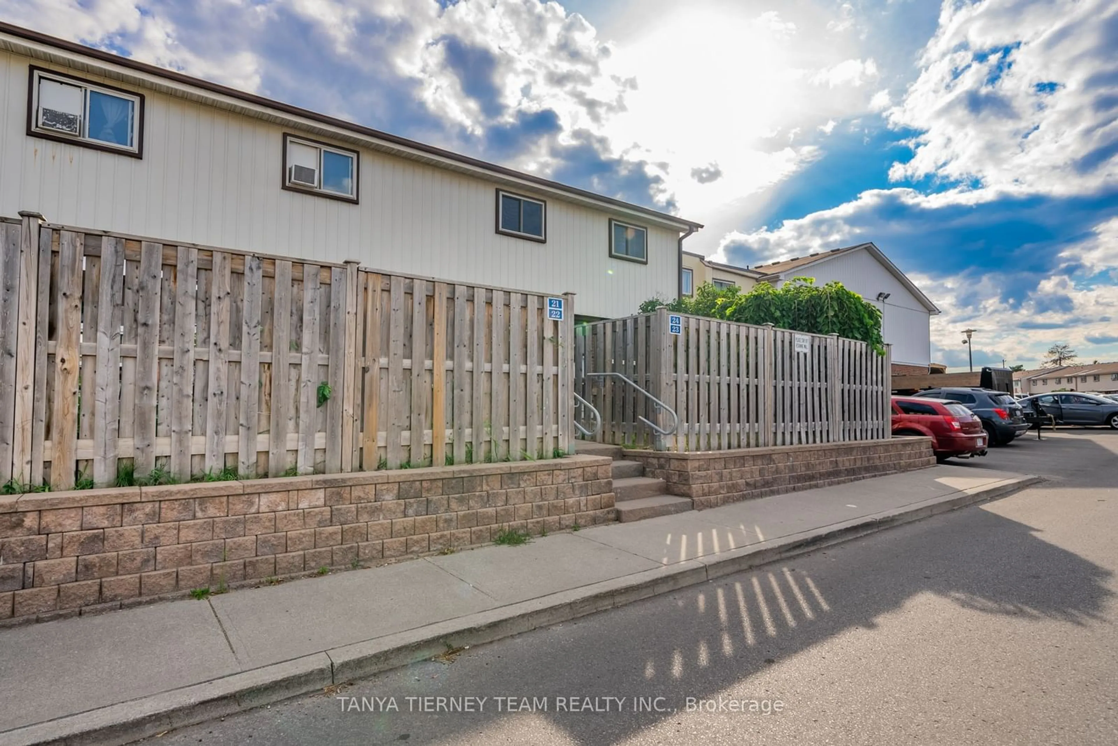 A pic from outside/outdoor area/front of a property/back of a property/a pic from drone, street for 120 Nonquon Rd #24, Oshawa Ontario L1G 7E6