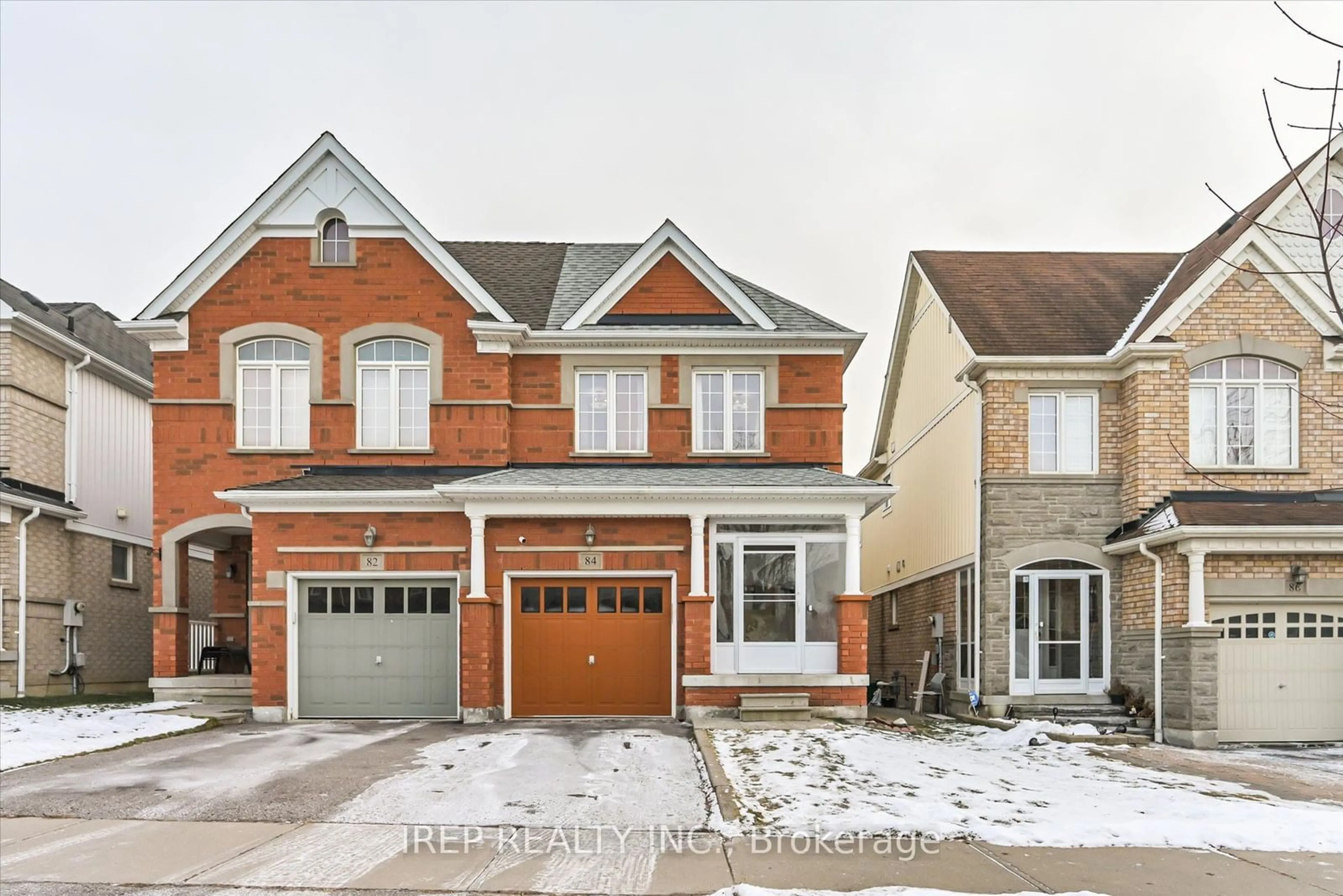 Home with brick exterior material, street for 84 Tozer Cres, Ajax Ontario L1T 5A2