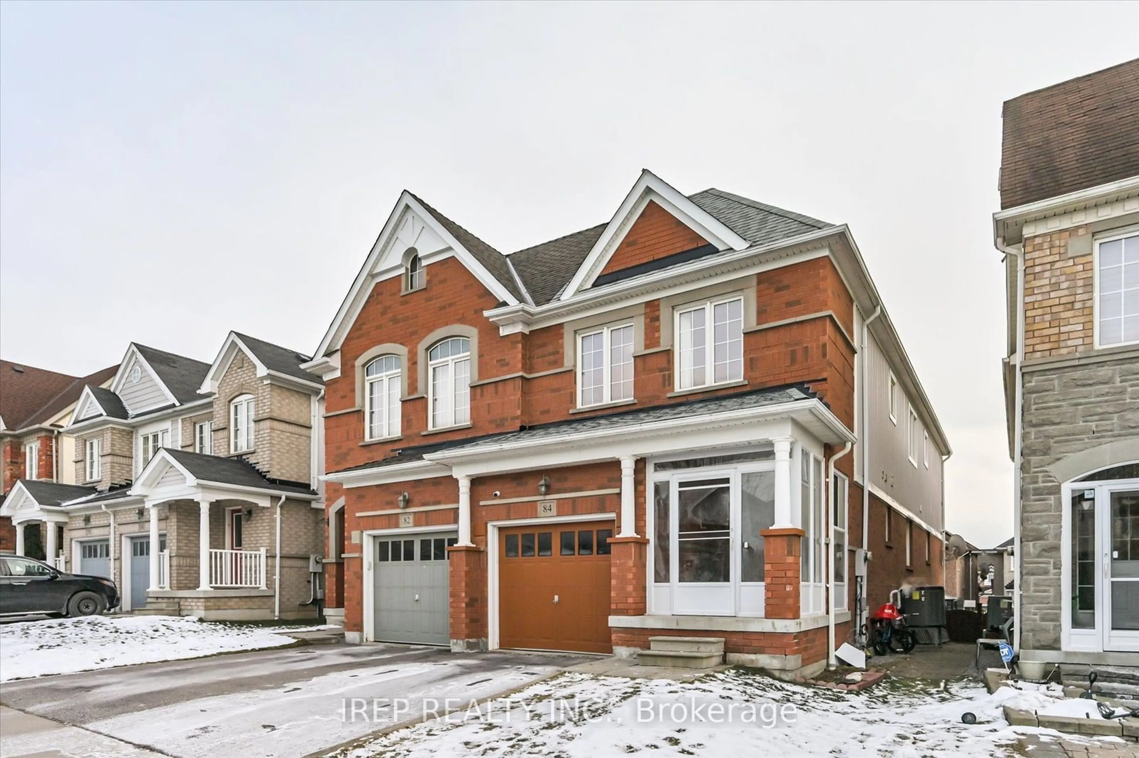 Home with brick exterior material, street for 84 Tozer Cres, Ajax Ontario L1T 5A2