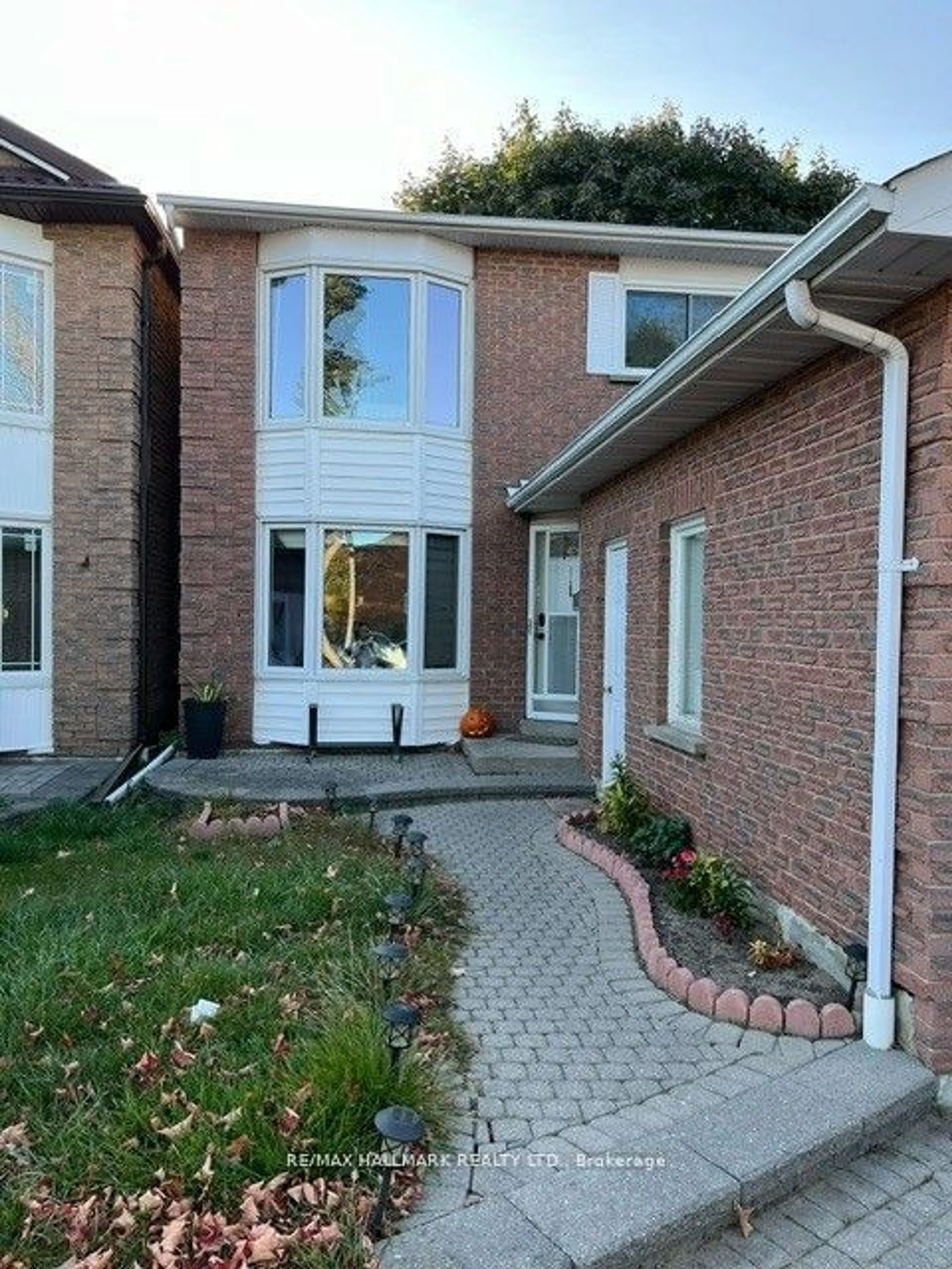 Home with brick exterior material, street for 49 Halfmoon Sq, Toronto Ontario M1C 3V4