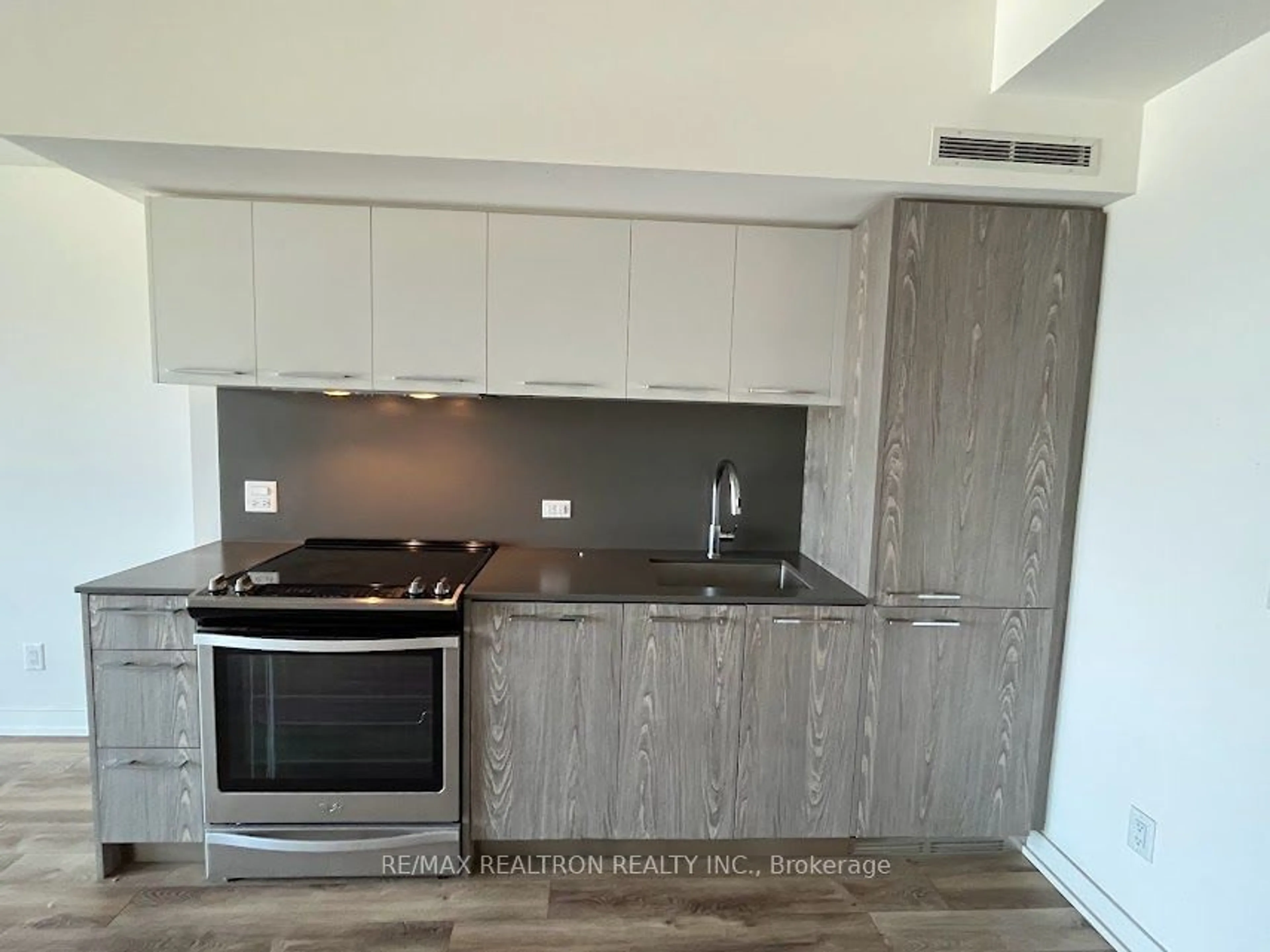 Standard kitchen, wood/laminate floor for 30 Baseball Pl #632, Toronto Ontario M4M 0E8