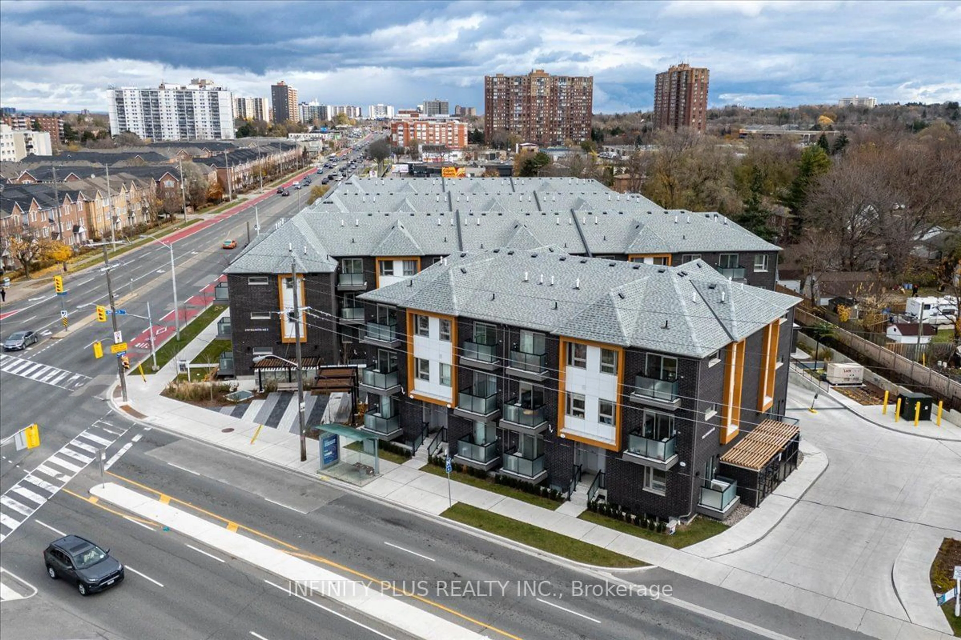 A pic from outside/outdoor area/front of a property/back of a property/a pic from drone, city buildings view from balcony for 1085 Danforth Rd #202, Toronto Ontario M1J 0B2