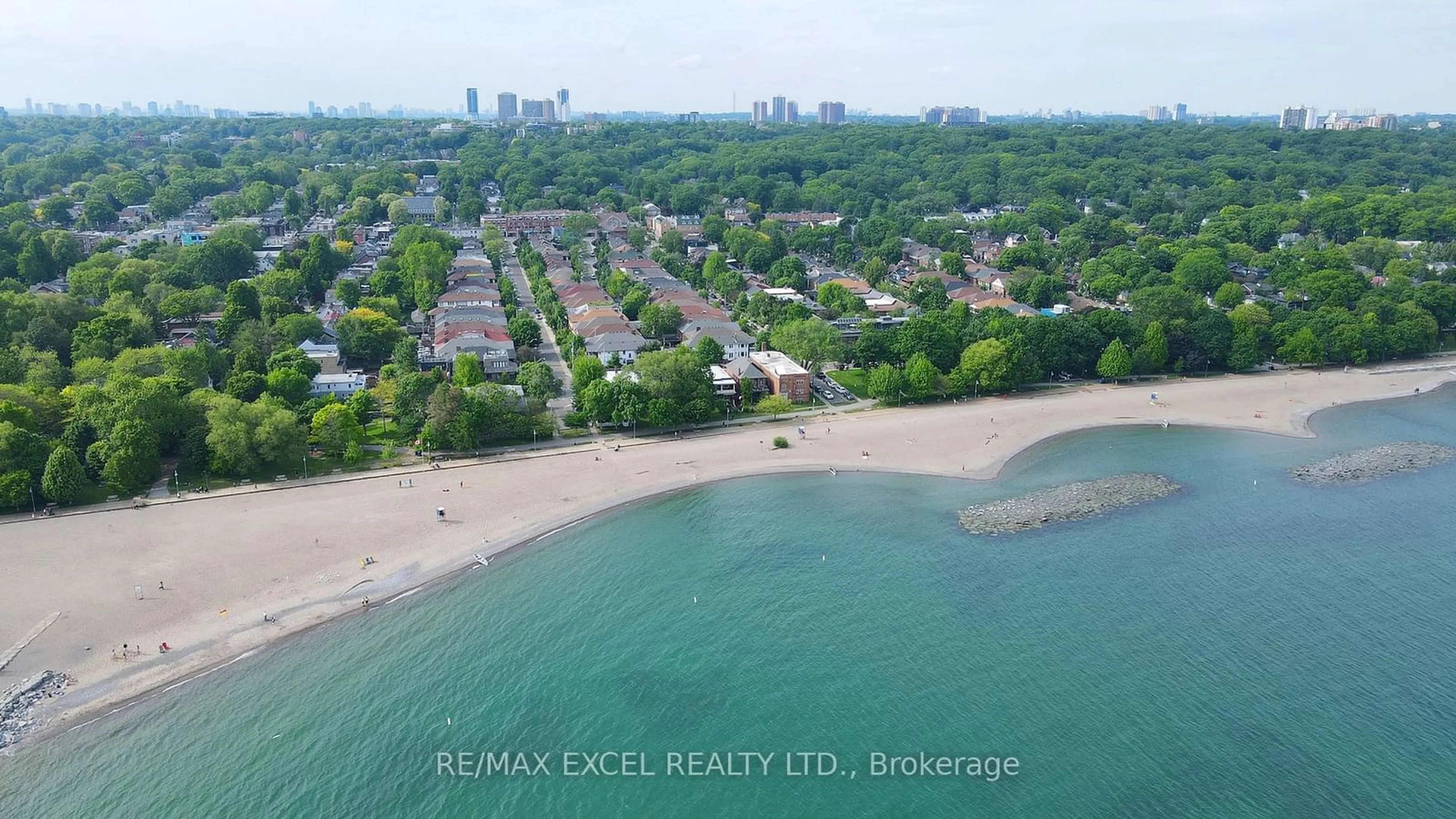 A pic from outside/outdoor area/front of a property/back of a property/a pic from drone, water/lake/river/ocean view for 44 Waverley Rd, Toronto Ontario M4L 3T1