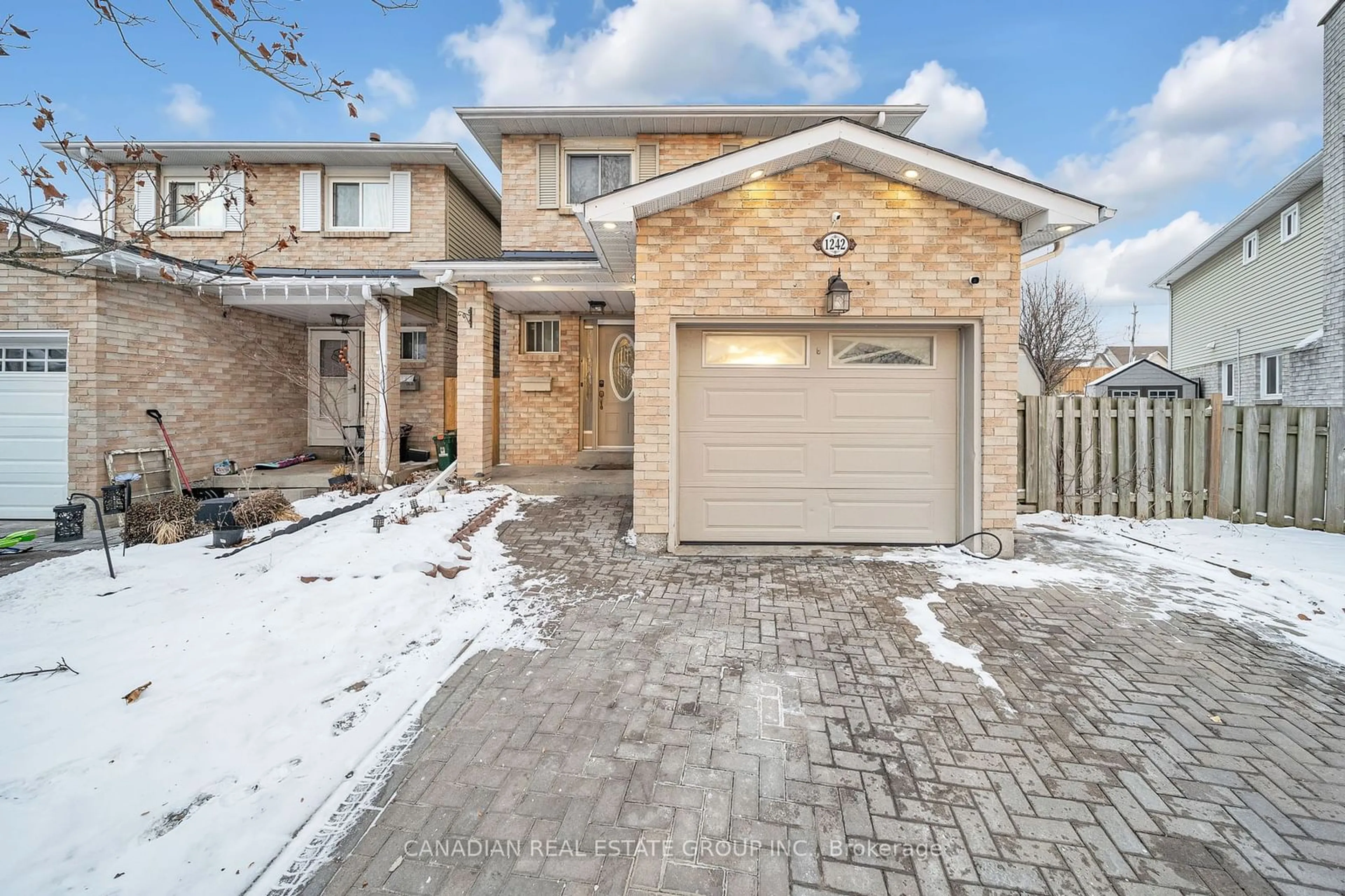 Home with brick exterior material, street for 1242 Delmark Crt, Oshawa Ontario L1H 8K6