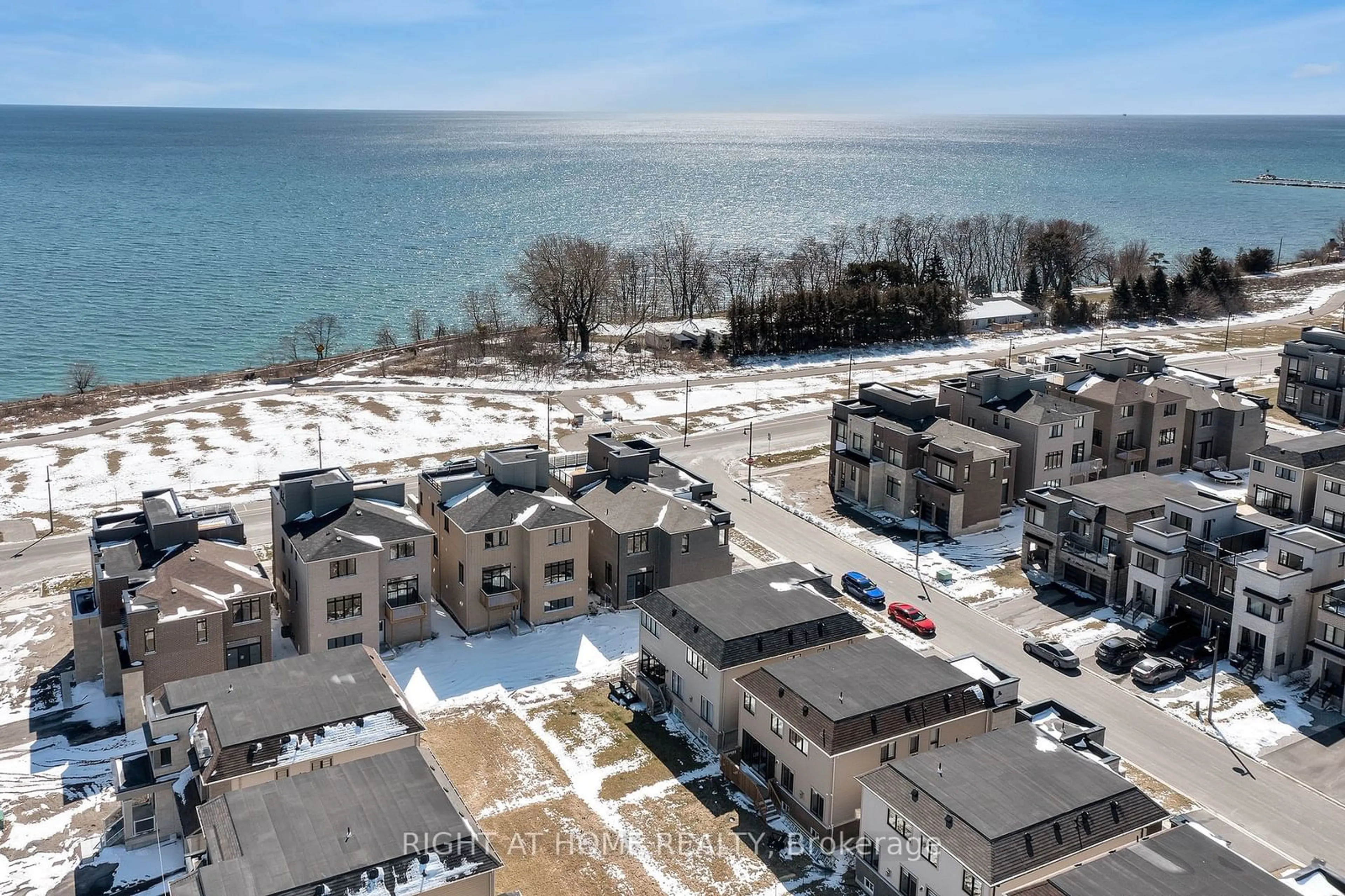 A pic from outside/outdoor area/front of a property/back of a property/a pic from drone, water/lake/river/ocean view for 3 Clipper Lane, Clarington Ontario L1C 4B1