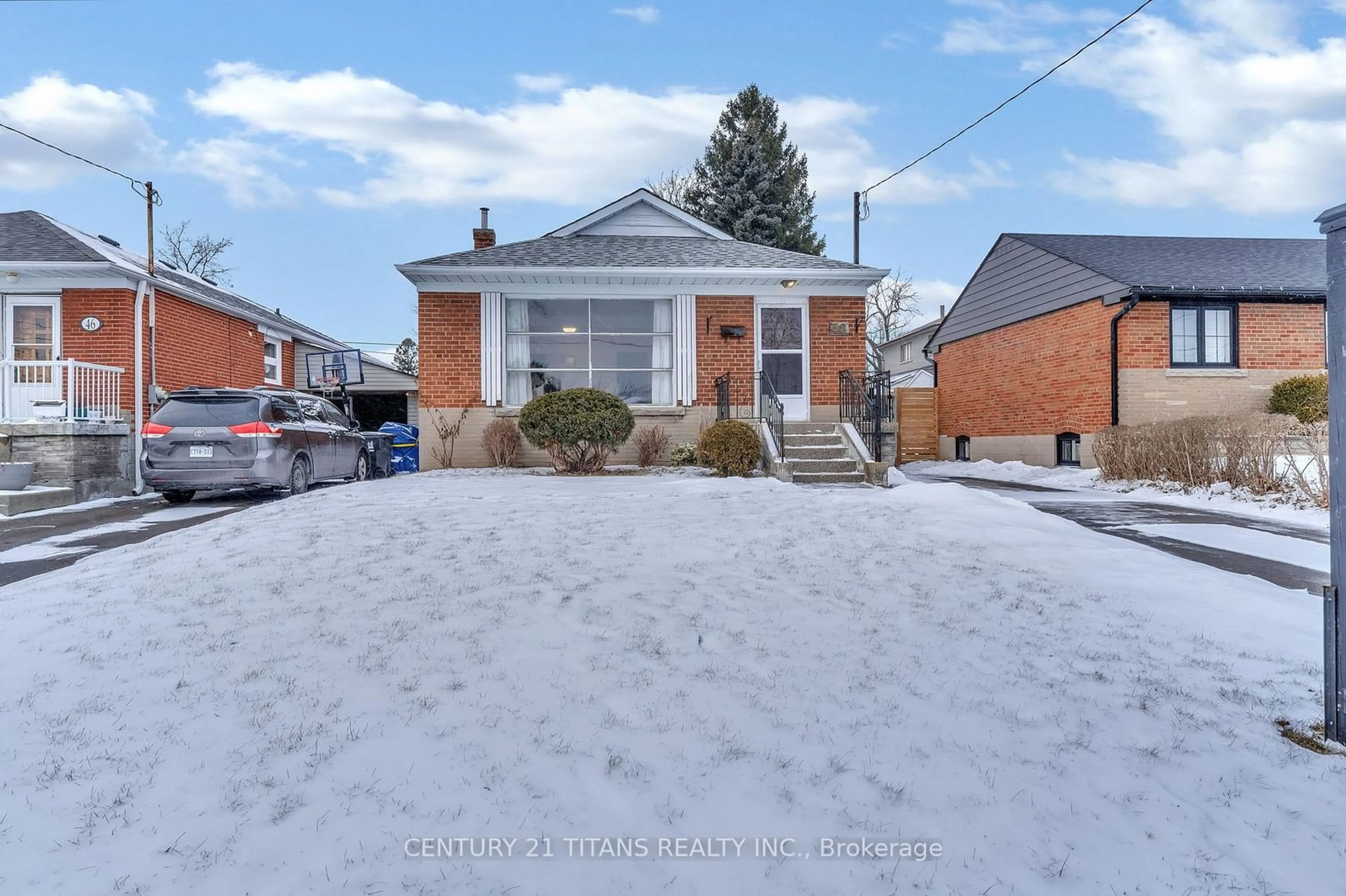 Home with brick exterior material, street for 48 Merrian Rd, Toronto Ontario M1K 3M7