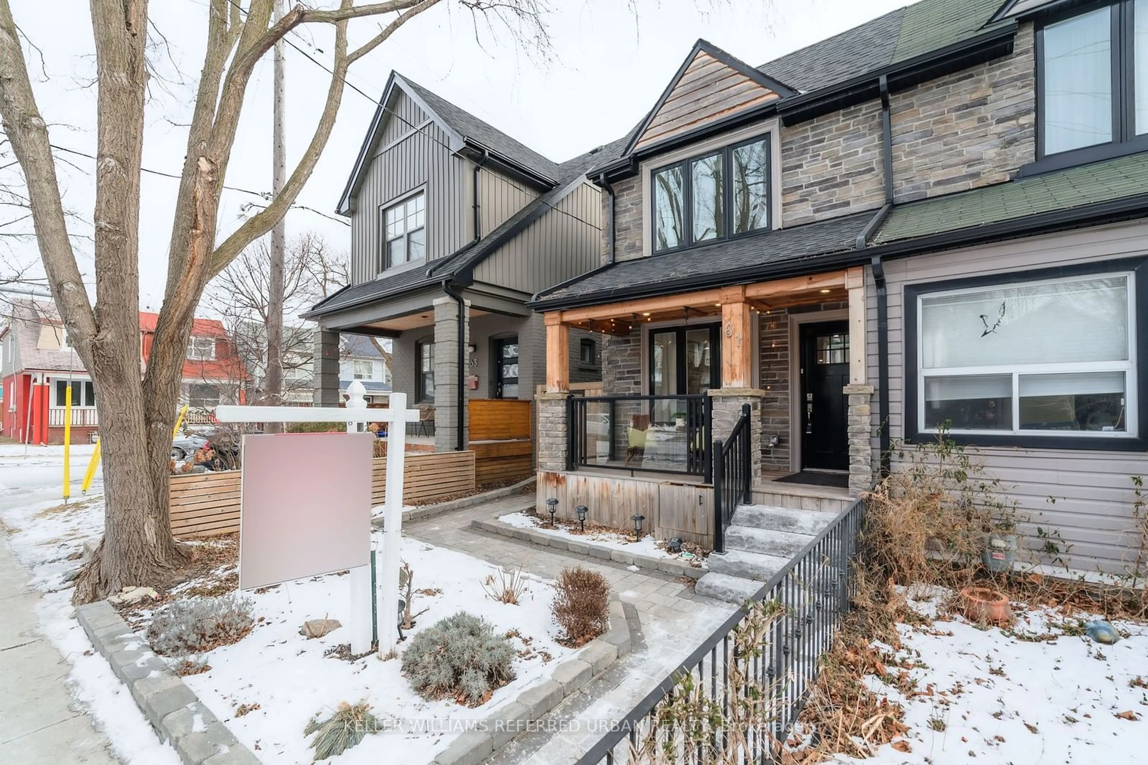 Home with brick exterior material, street for 61 Roseheath Ave, Toronto Ontario M4C 3P4