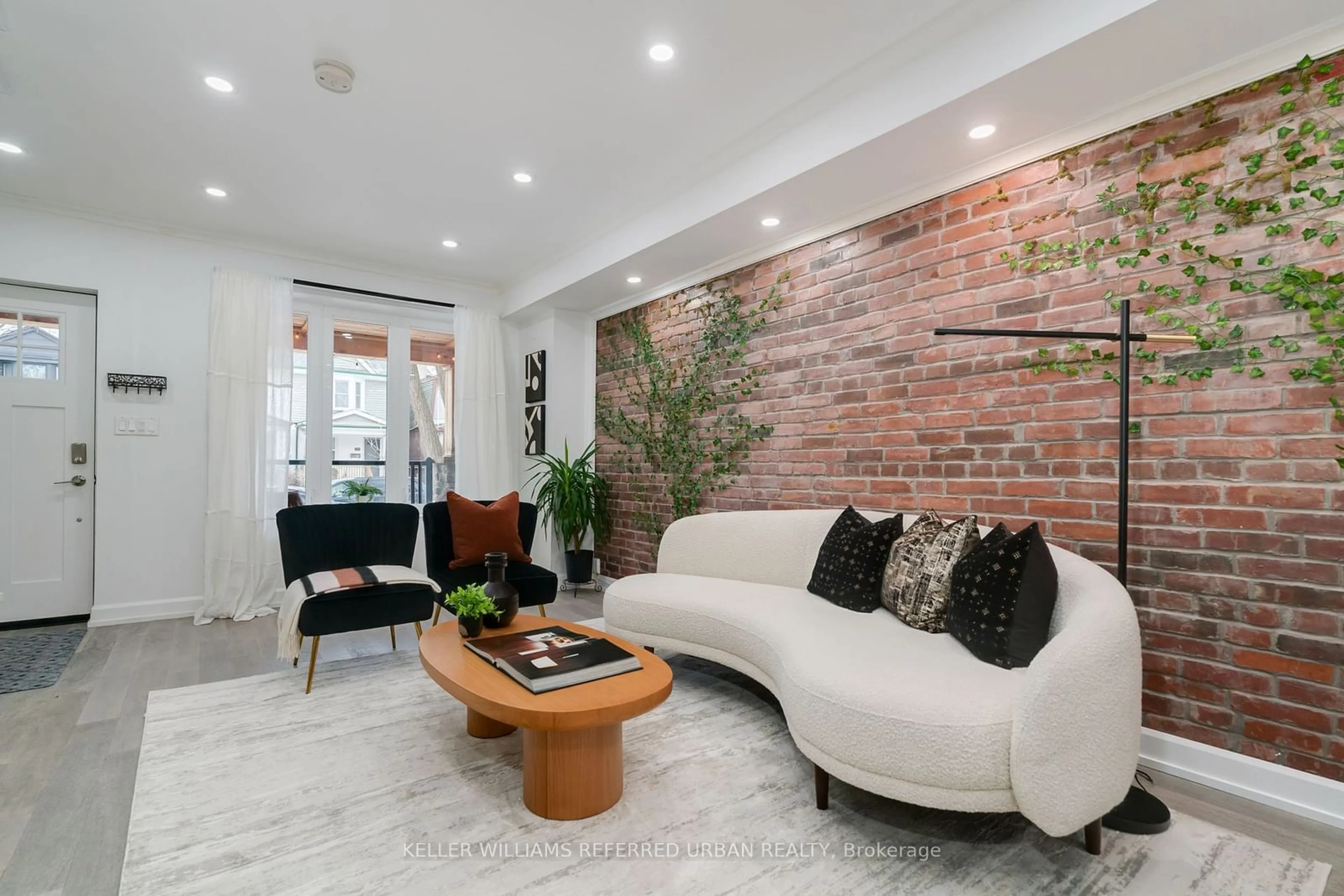 Living room with furniture, ceramic/tile floor for 61 Roseheath Ave, Toronto Ontario M4C 3P4