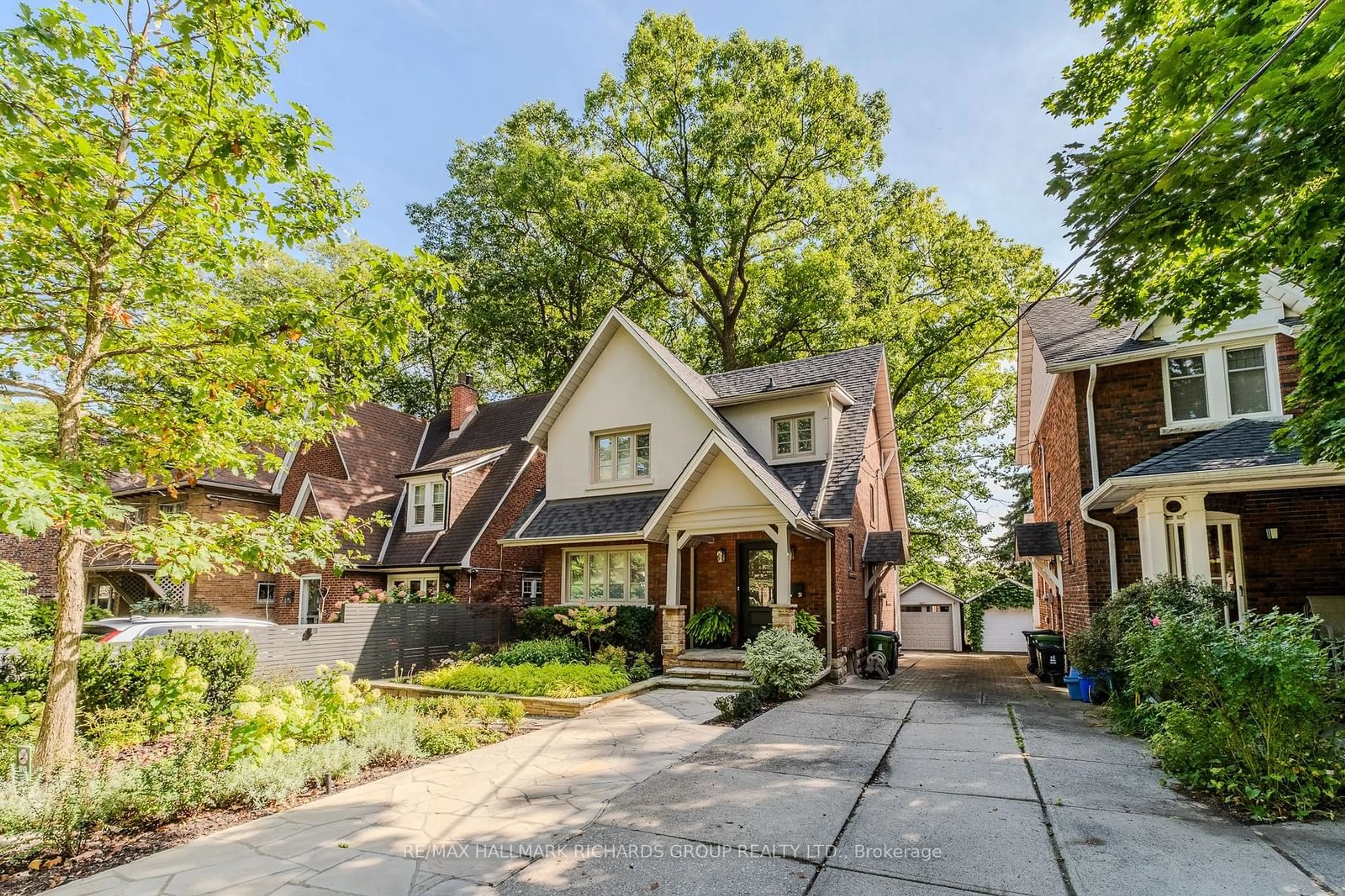 Home with brick exterior material, street for 51 Beaufort Rd, Toronto Ontario M4E 1M8