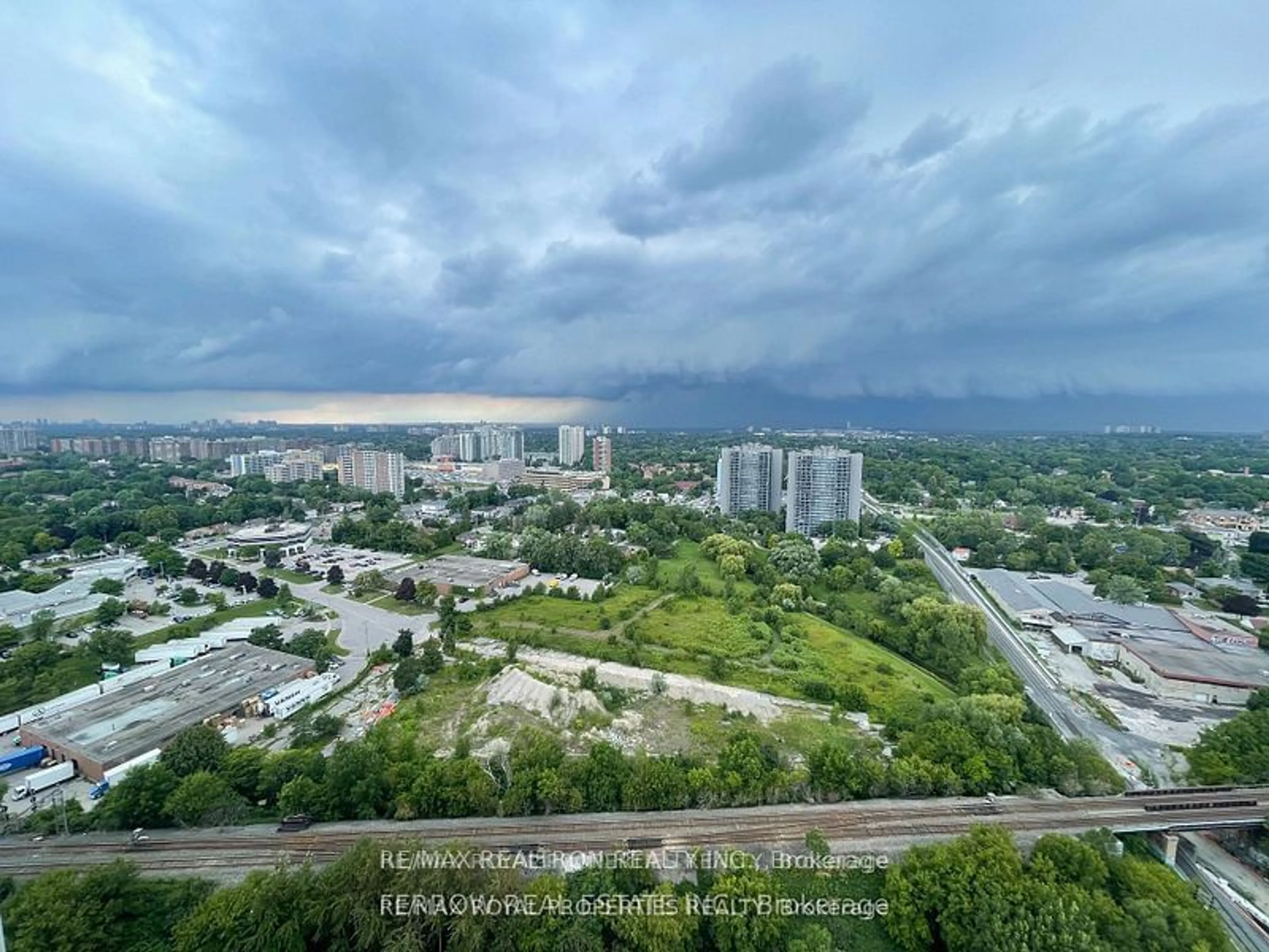 A pic from outside/outdoor area/front of a property/back of a property/a pic from drone, city buildings view from balcony for 225 Village Green Sq #2503, Toronto Ontario M1S 0N4