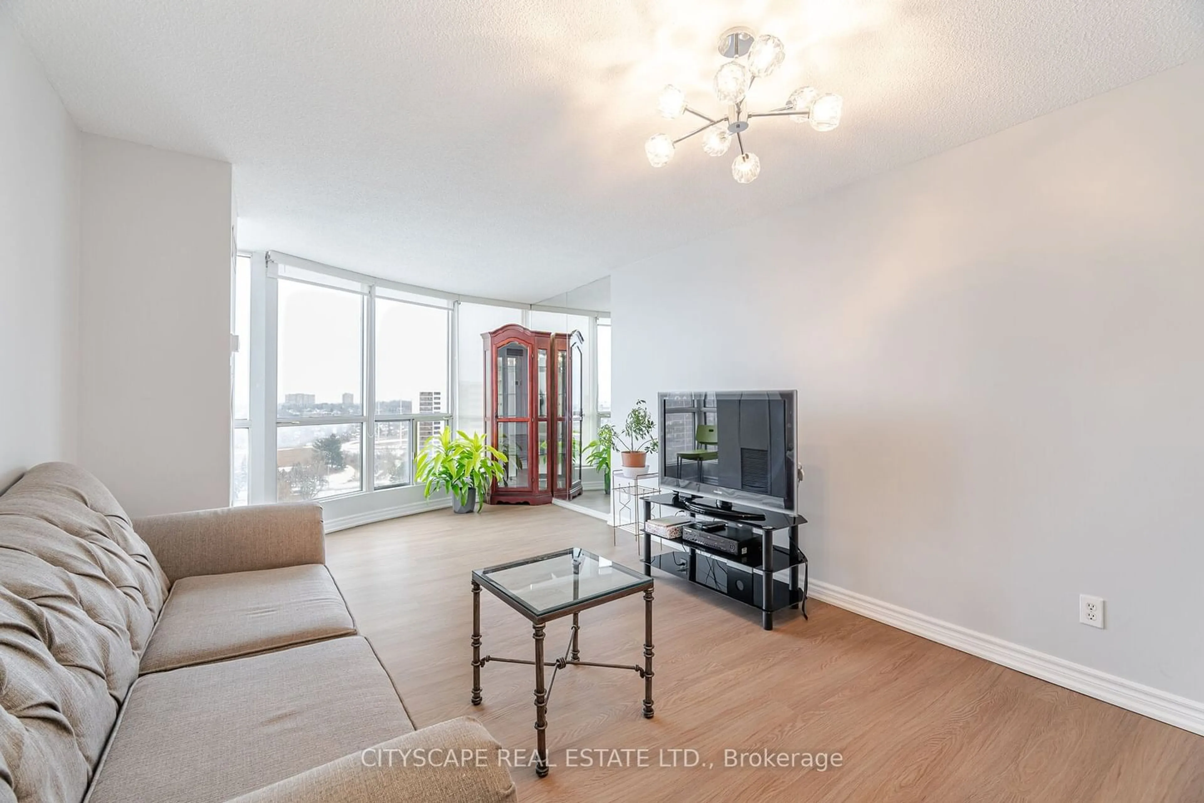 Living room with furniture, unknown for 2550 Lawrence Ave #1411, Toronto Ontario M1P 4Z3