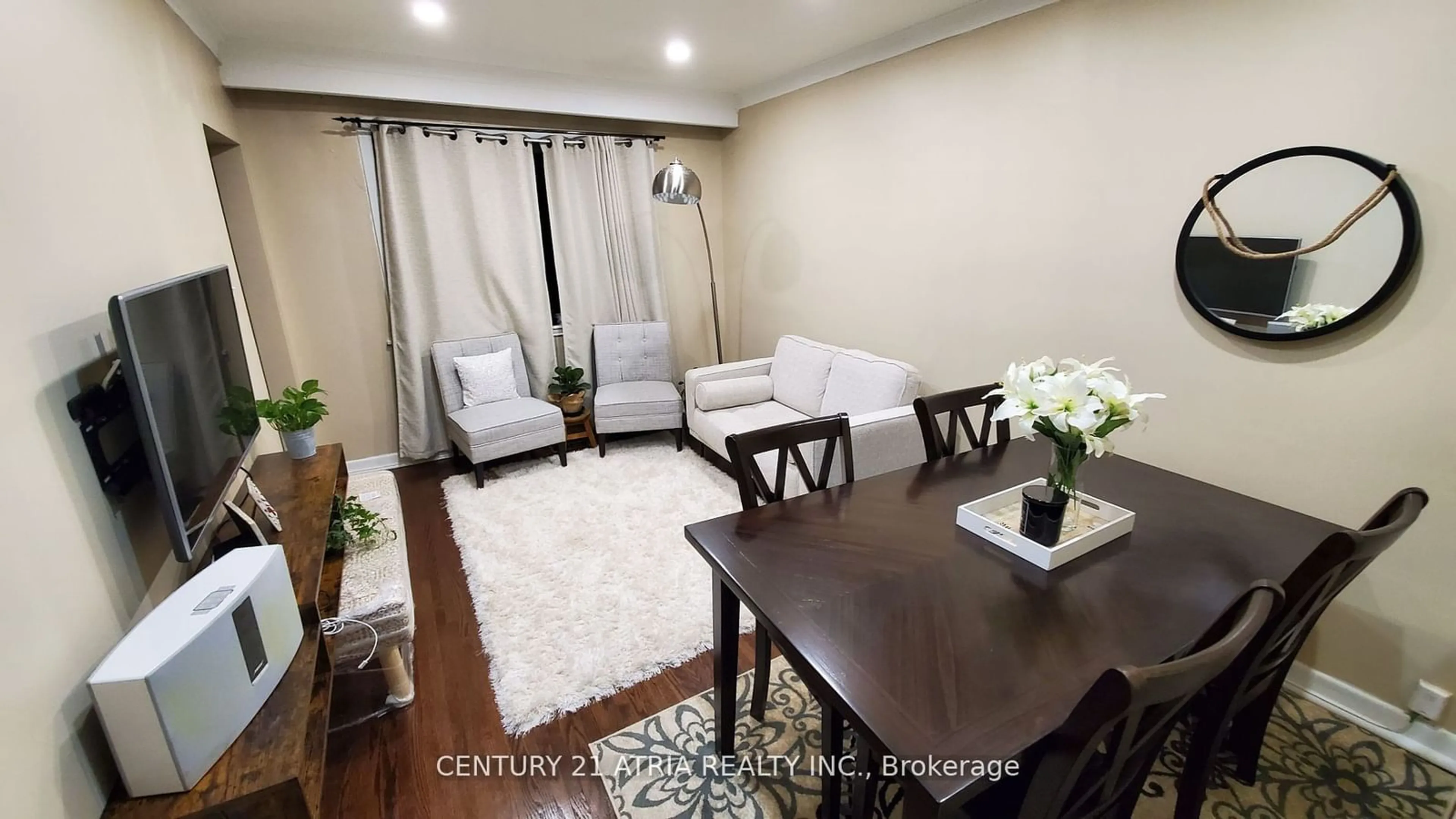 Living room with furniture, wood/laminate floor for 95 Prairie Dr, Toronto Ontario M1L 1L6