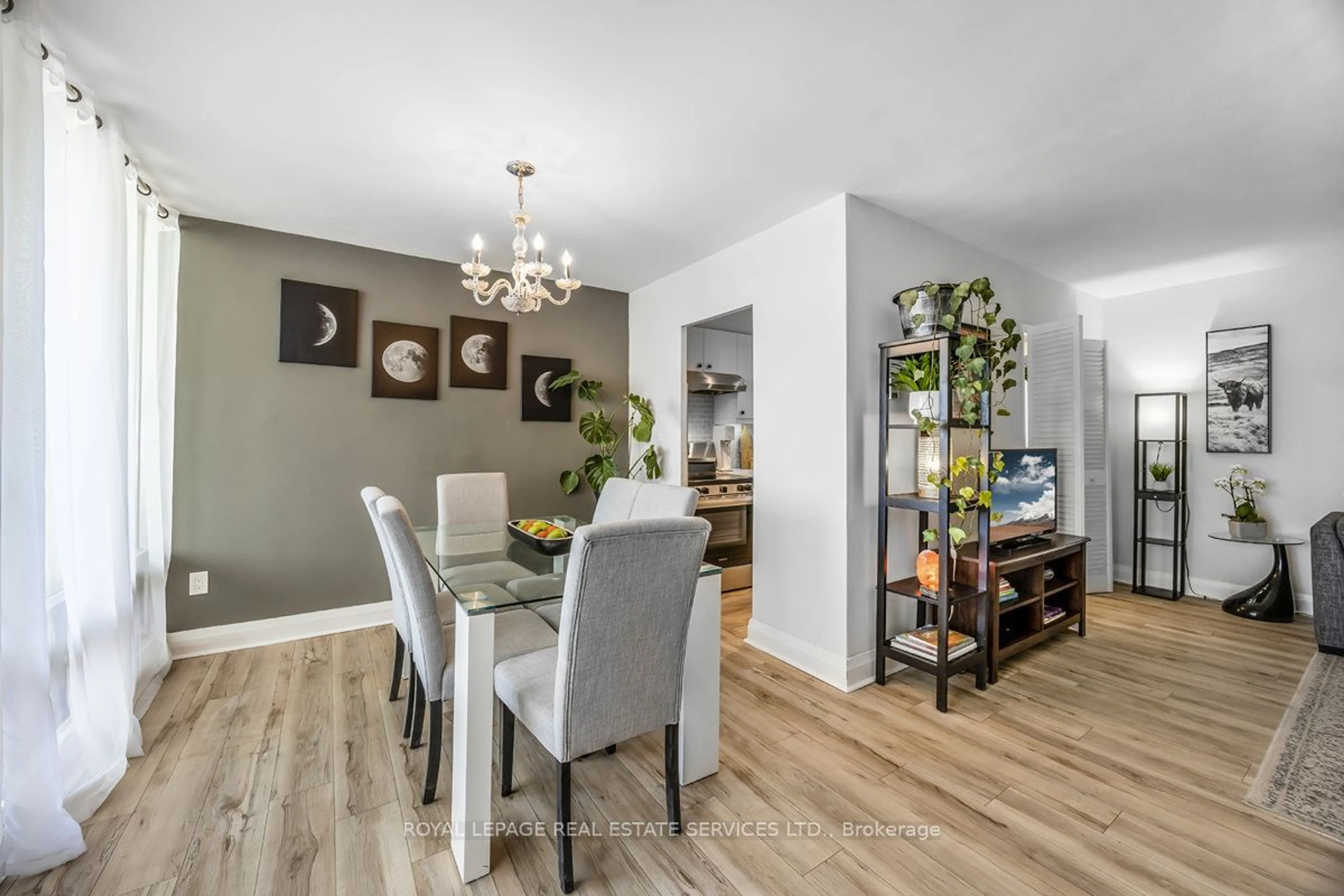 Dining room, wood/laminate floor for 5 Massey Sq #2810, Toronto Ontario M4C 5L6