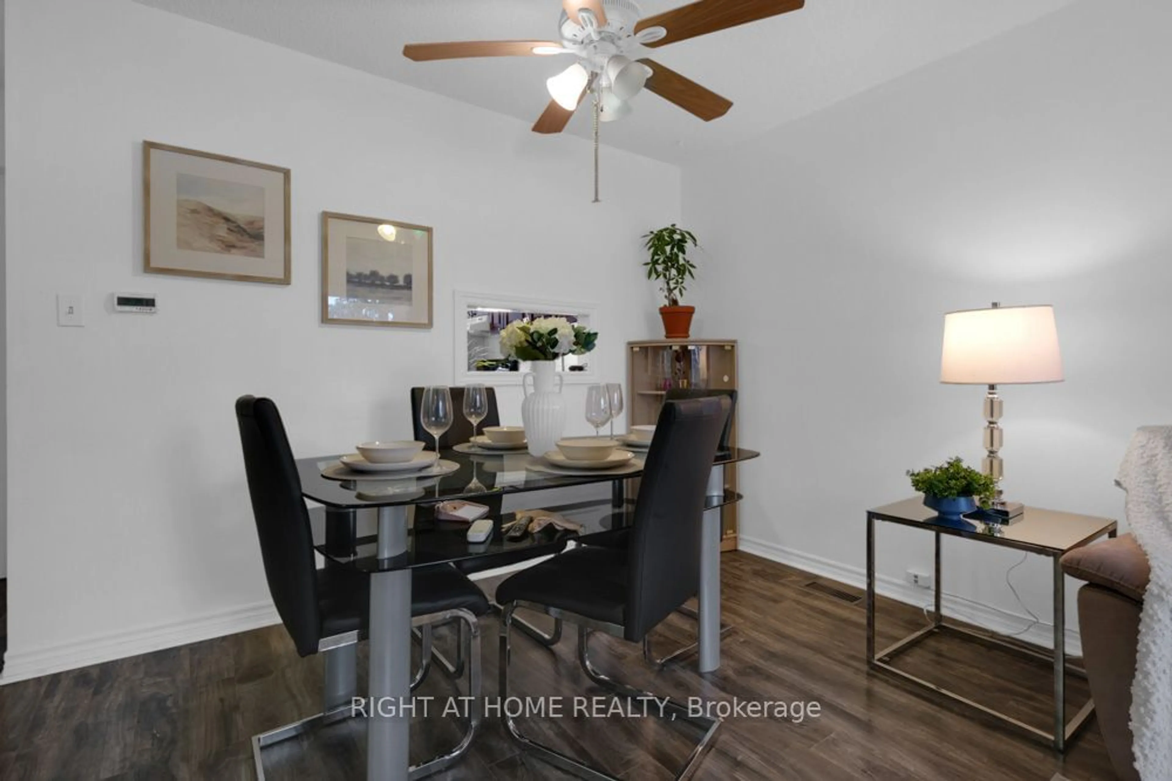 Dining room, wood/laminate floor for 170 Wickson Tr #24, Toronto Ontario M1B 1M4