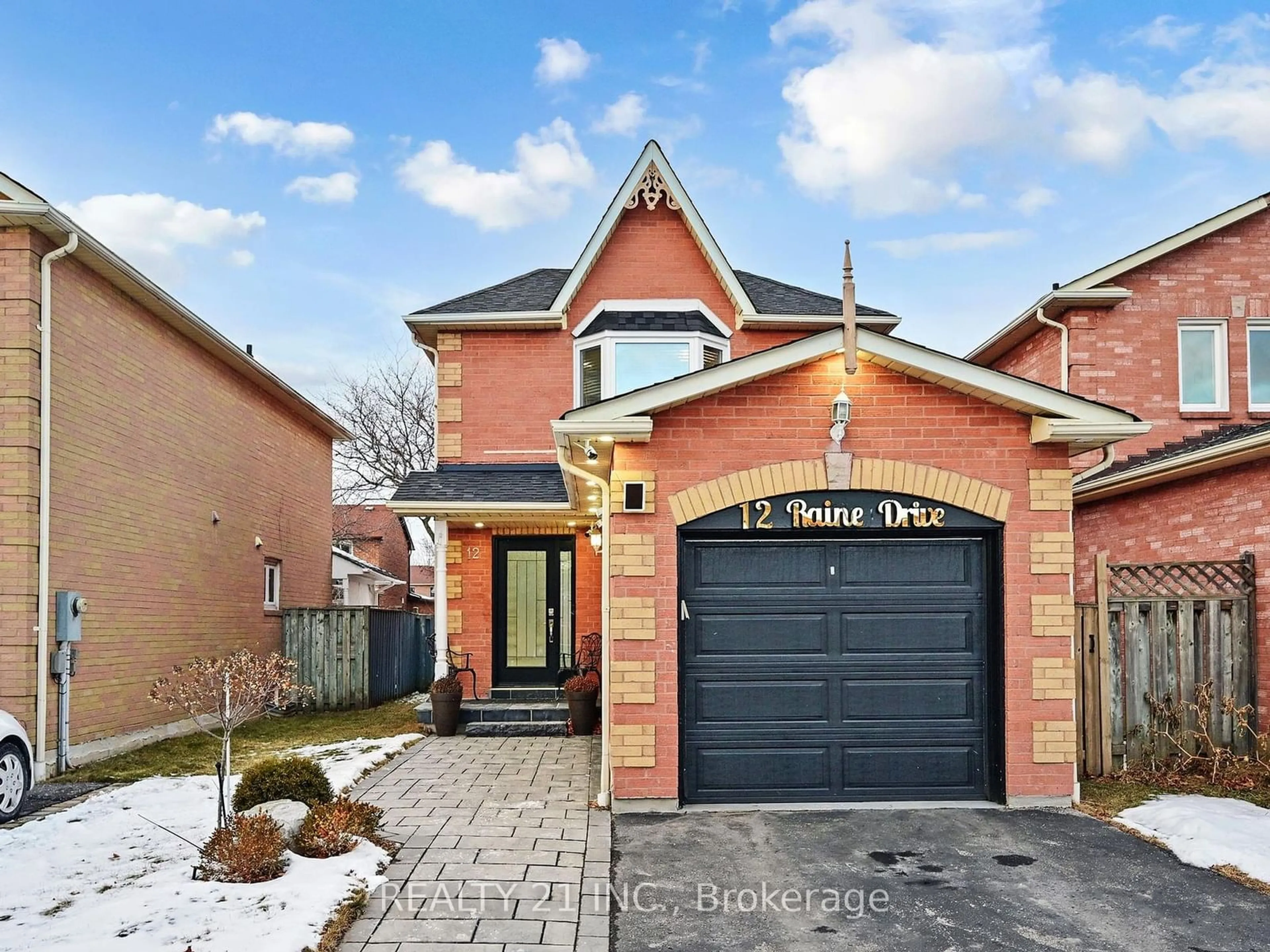 Home with brick exterior material, street for 12 Raine Dr, Ajax Ontario L1T 3L6