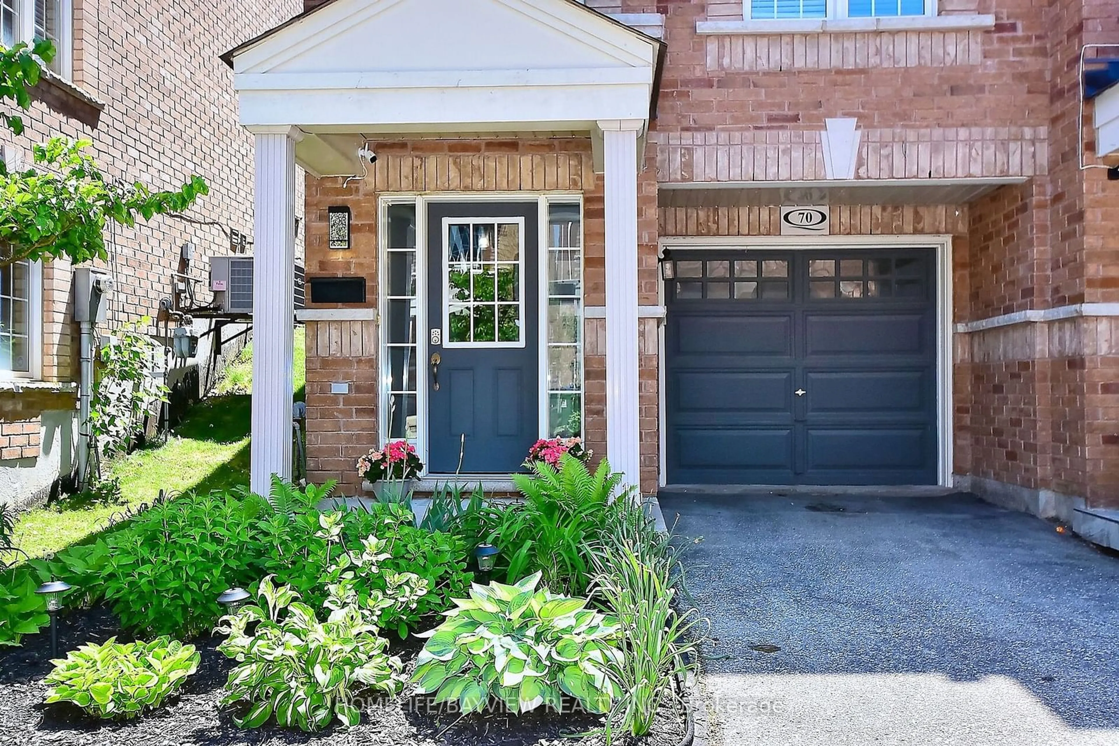 Home with brick exterior material, street for 70 Jeremiah Lane, Toronto Ontario M1J 0A4