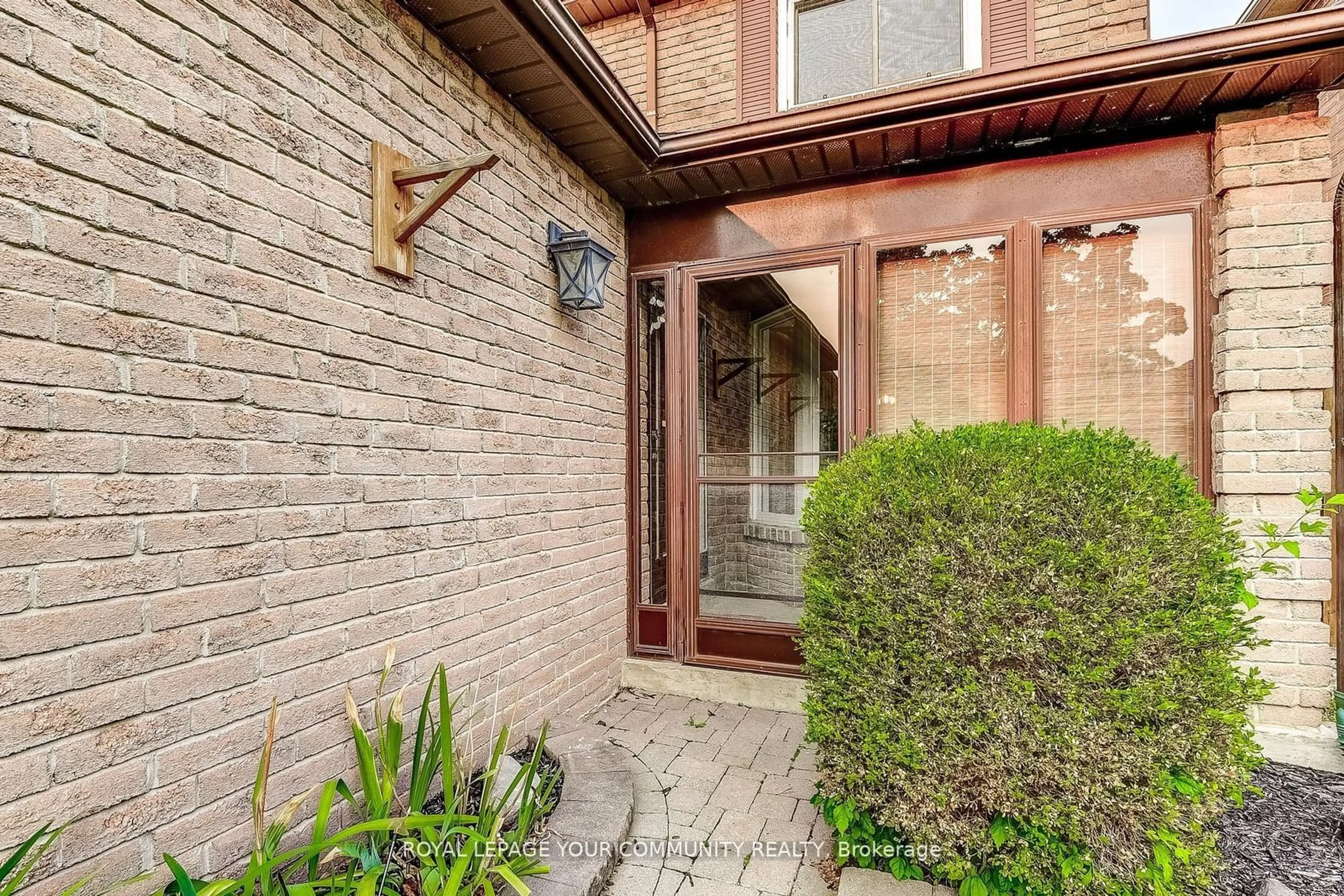 Home with brick exterior material, street for 65 Tideswell Blvd, Toronto Ontario M1B 4X9