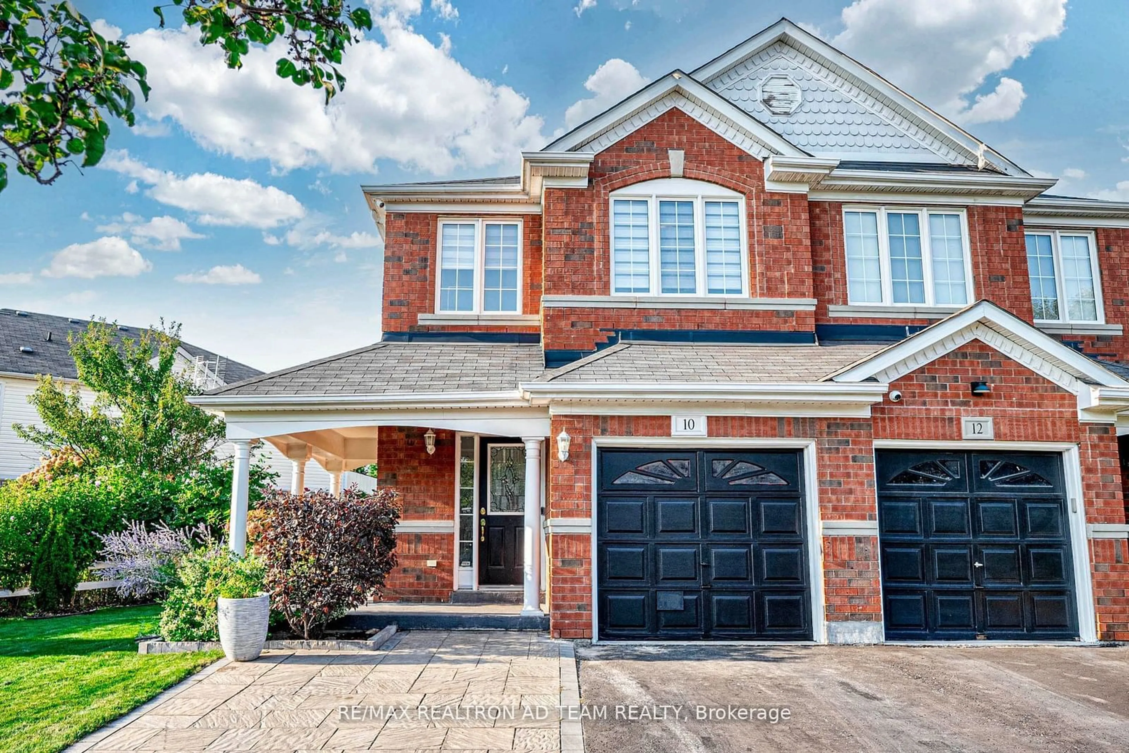 Home with brick exterior material, street for 10 Tozer Cres, Ajax Ontario L1T 4Z9