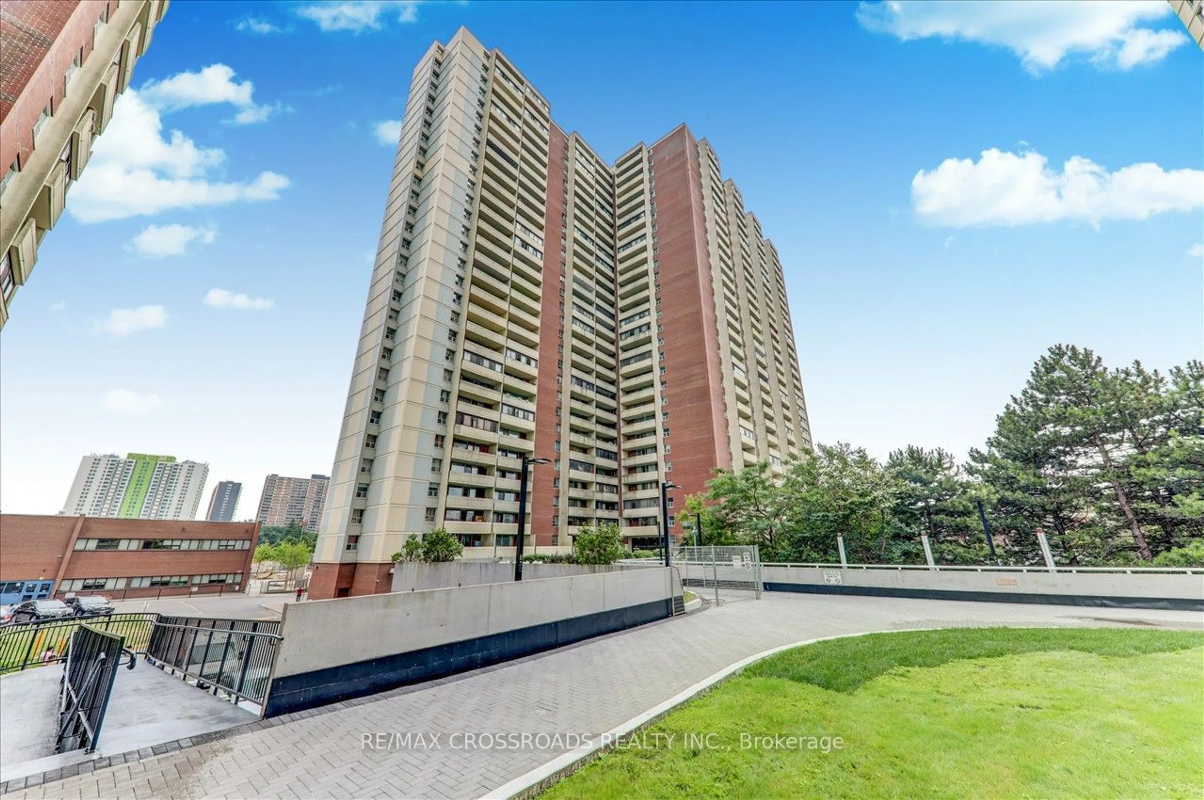 Patio, city buildings view from balcony for 5 Massey Sq #910, Toronto Ontario M4C 5L6