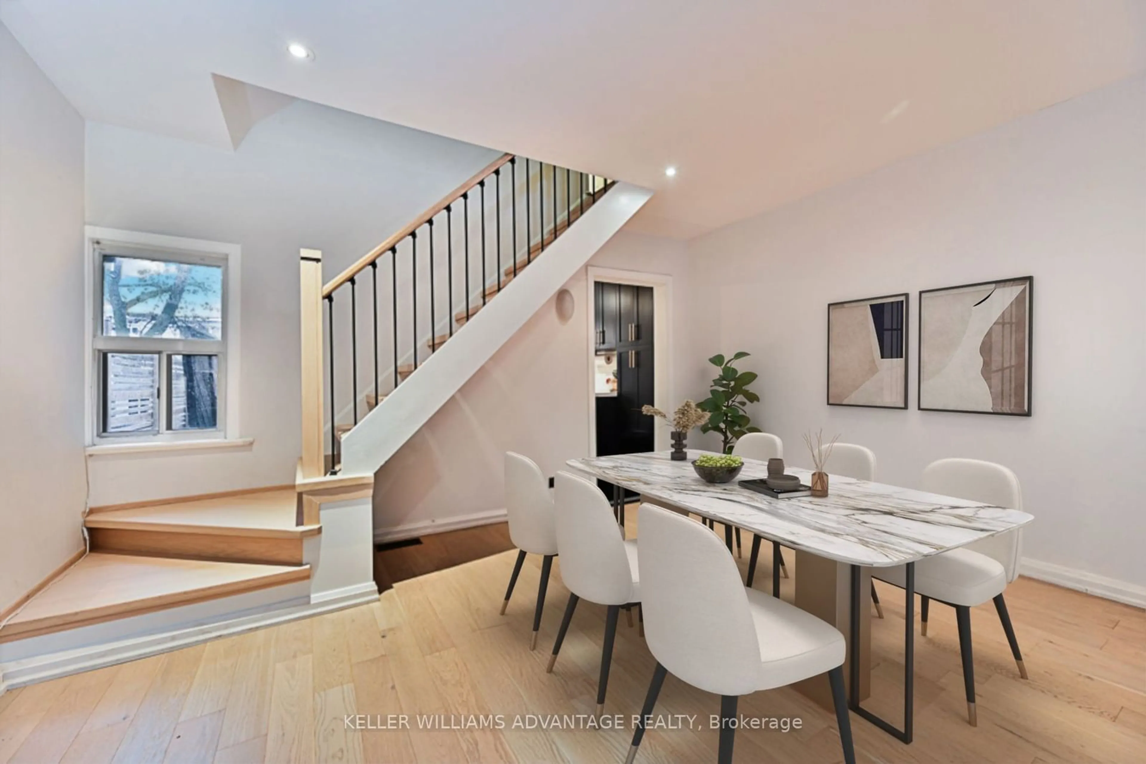 Dining room, wood/laminate floor for 21 Rosevear Ave, Toronto Ontario M4C 1Z1