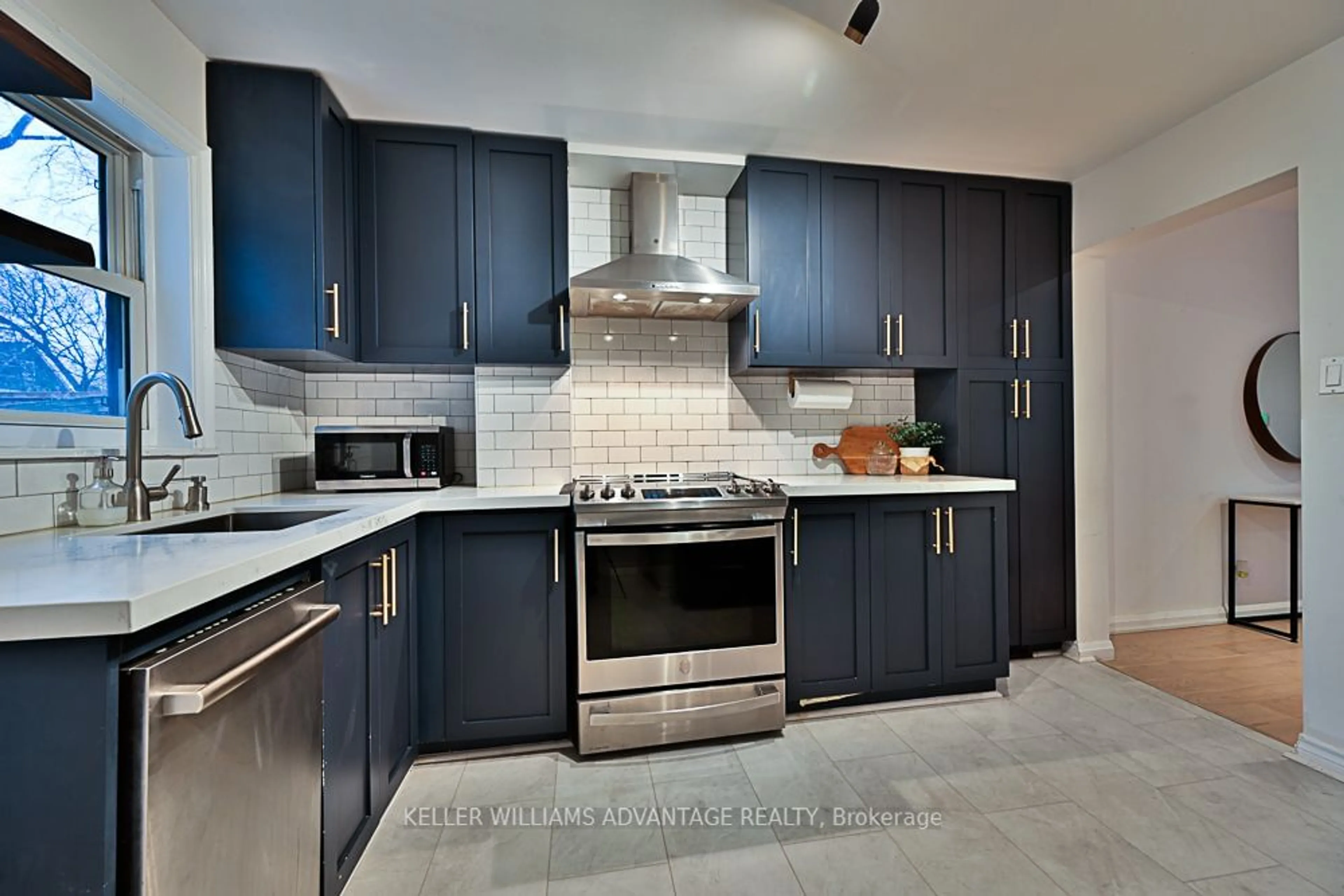 Contemporary kitchen, ceramic/tile floor for 21 Rosevear Ave, Toronto Ontario M4C 1Z1