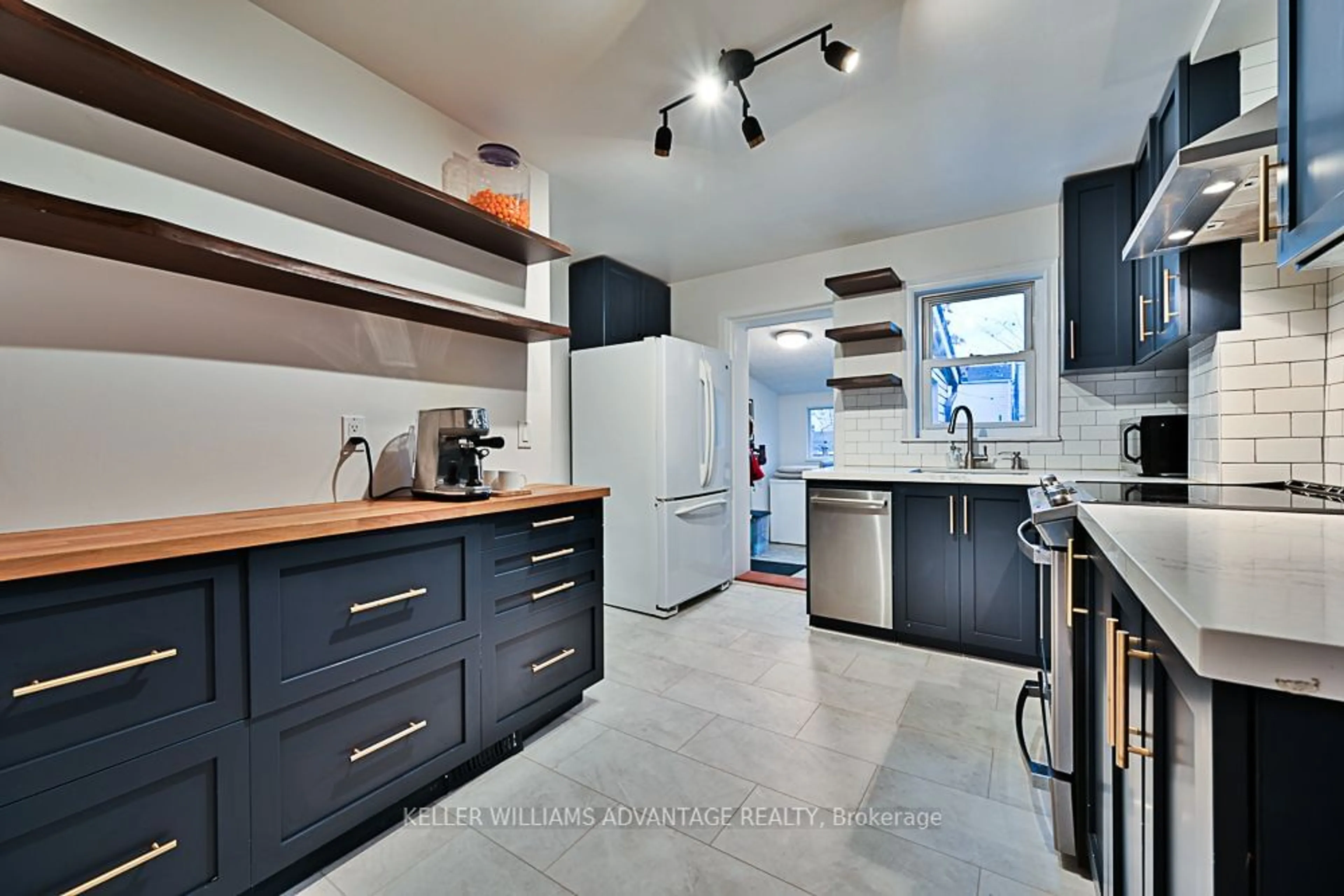 Contemporary kitchen, ceramic/tile floor for 21 Rosevear Ave, Toronto Ontario M4C 1Z1