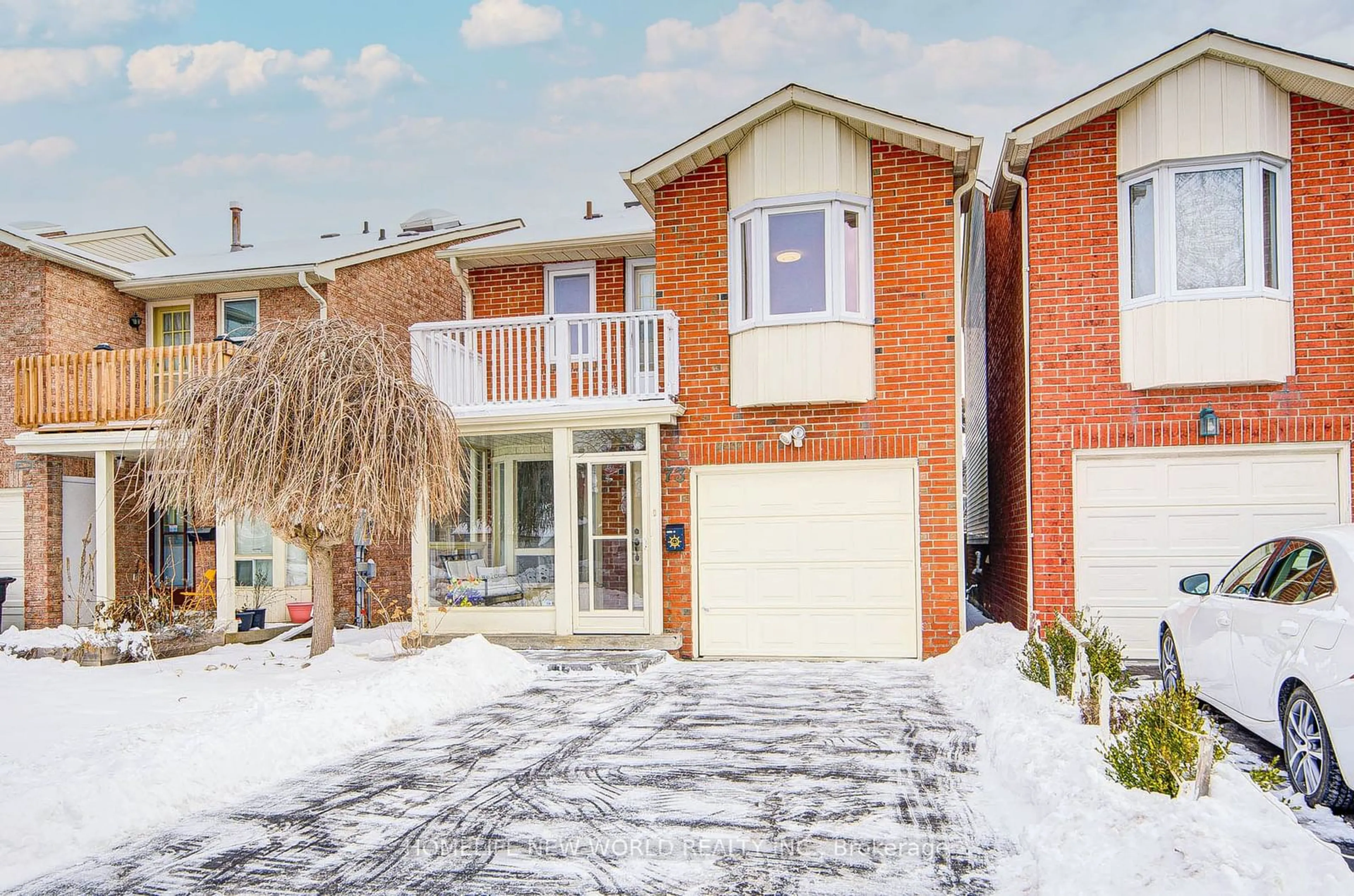 Home with brick exterior material, street for 73 River Grove Dr, Toronto Ontario M1W 3T8