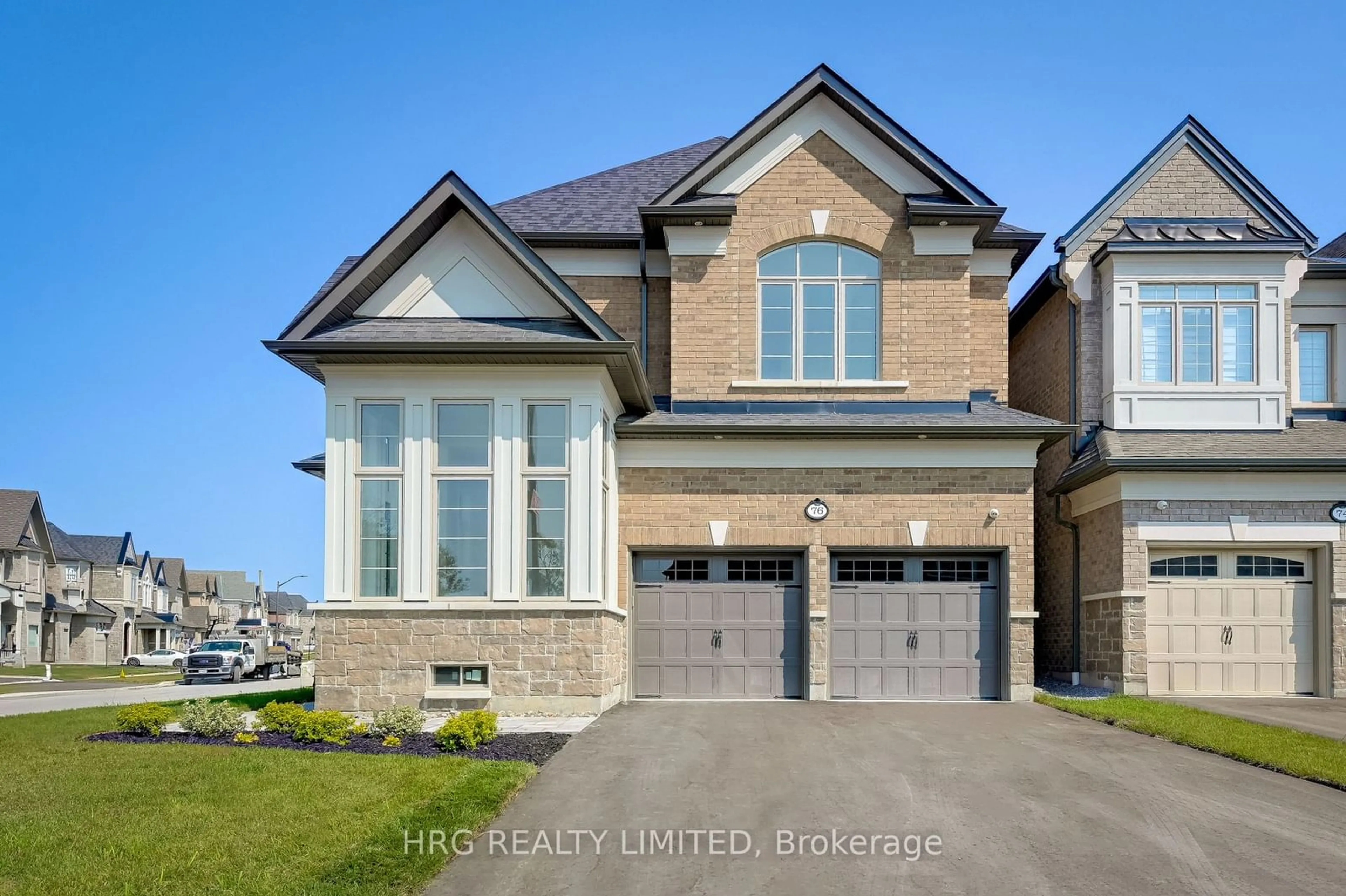 Home with brick exterior material, street for 76 Deer Ridge Cres, Whitby Ontario L1P 0P2