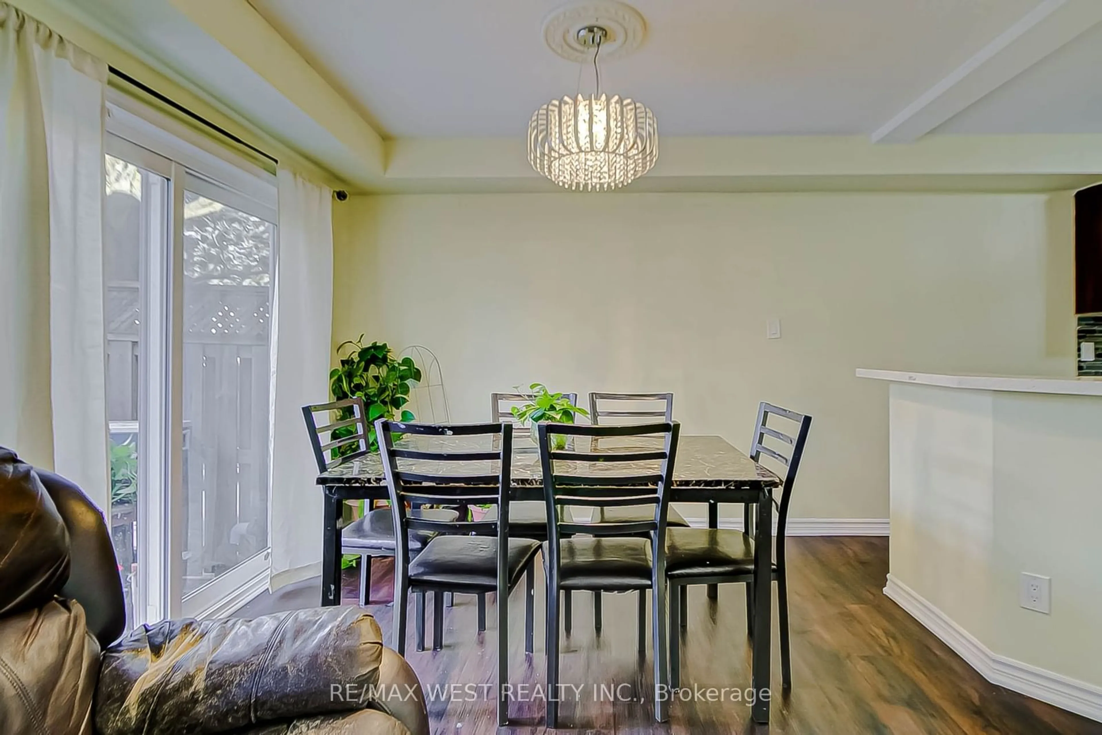 Dining room, wood/laminate floor for 6400 Lawrence Ave #12, Toronto Ontario M1C 5C6