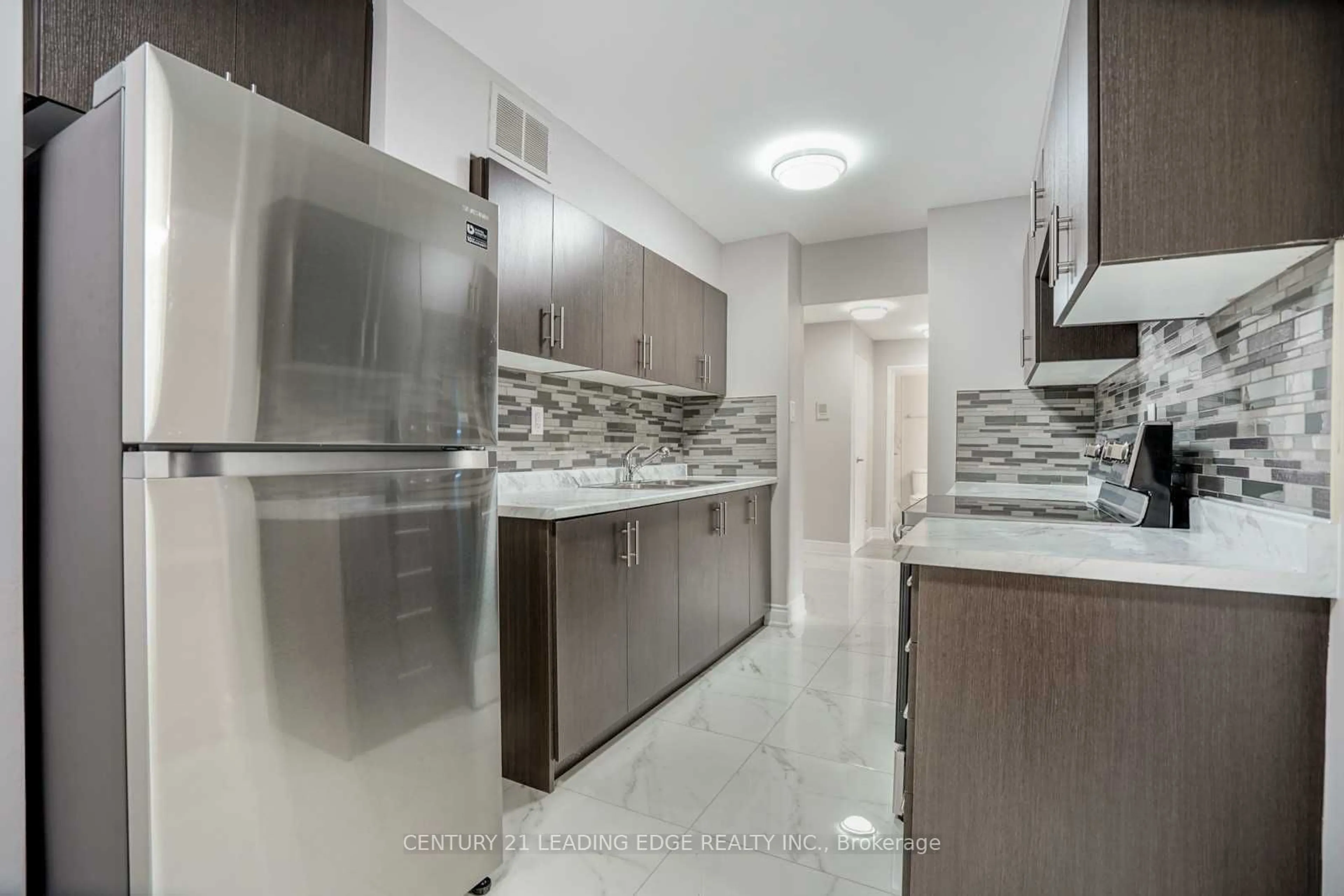 Standard kitchen, ceramic/tile floor for 180 Markham Rd #207, Toronto Ontario M1M 2Z9