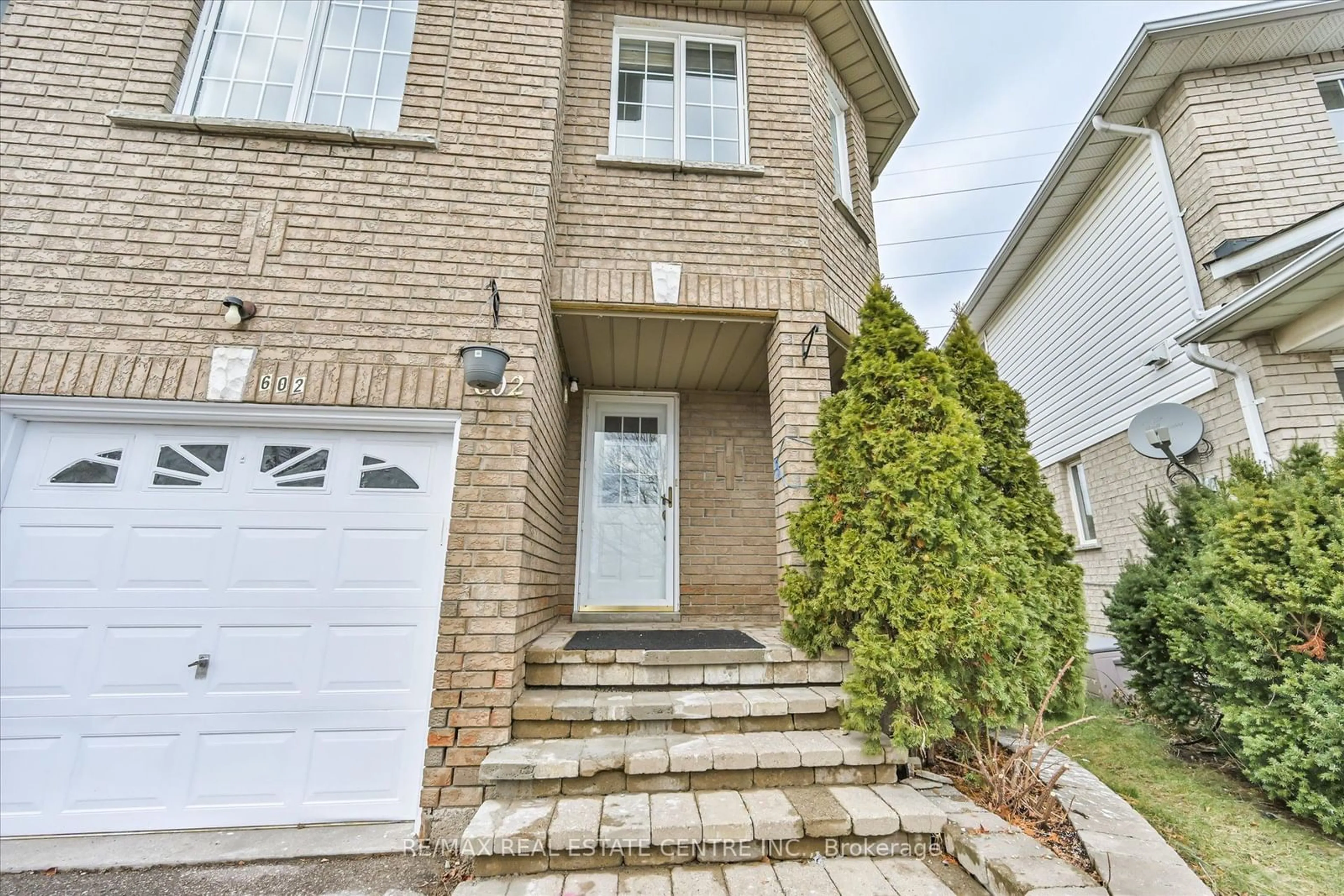 Home with brick exterior material, street for 602 Amaretto Ave, Pickering Ontario L1X 2V2