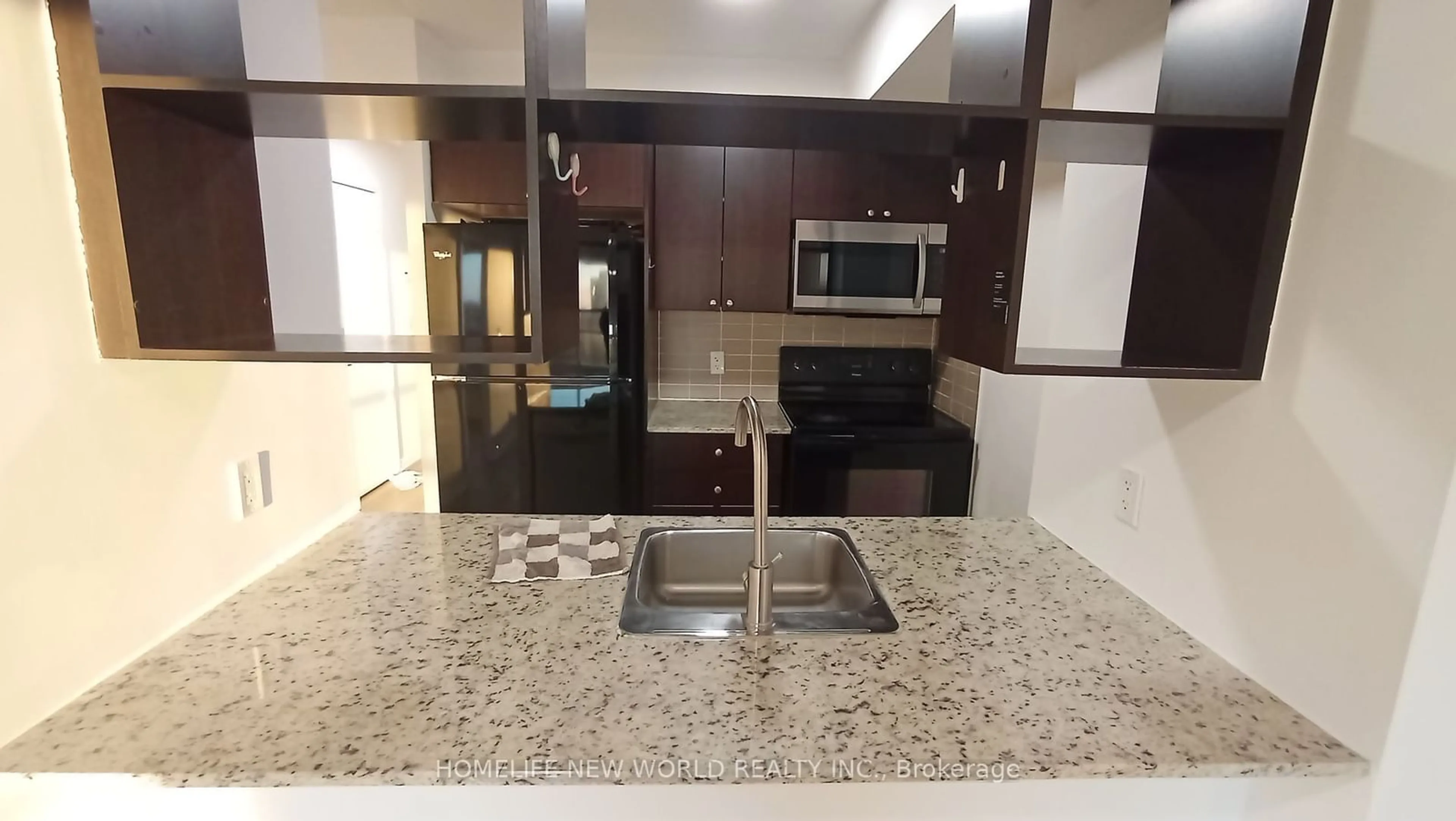 Open concept kitchen, ceramic/tile floor for 181 Village Green Sq #1515, Toronto Ontario M1S 0K6