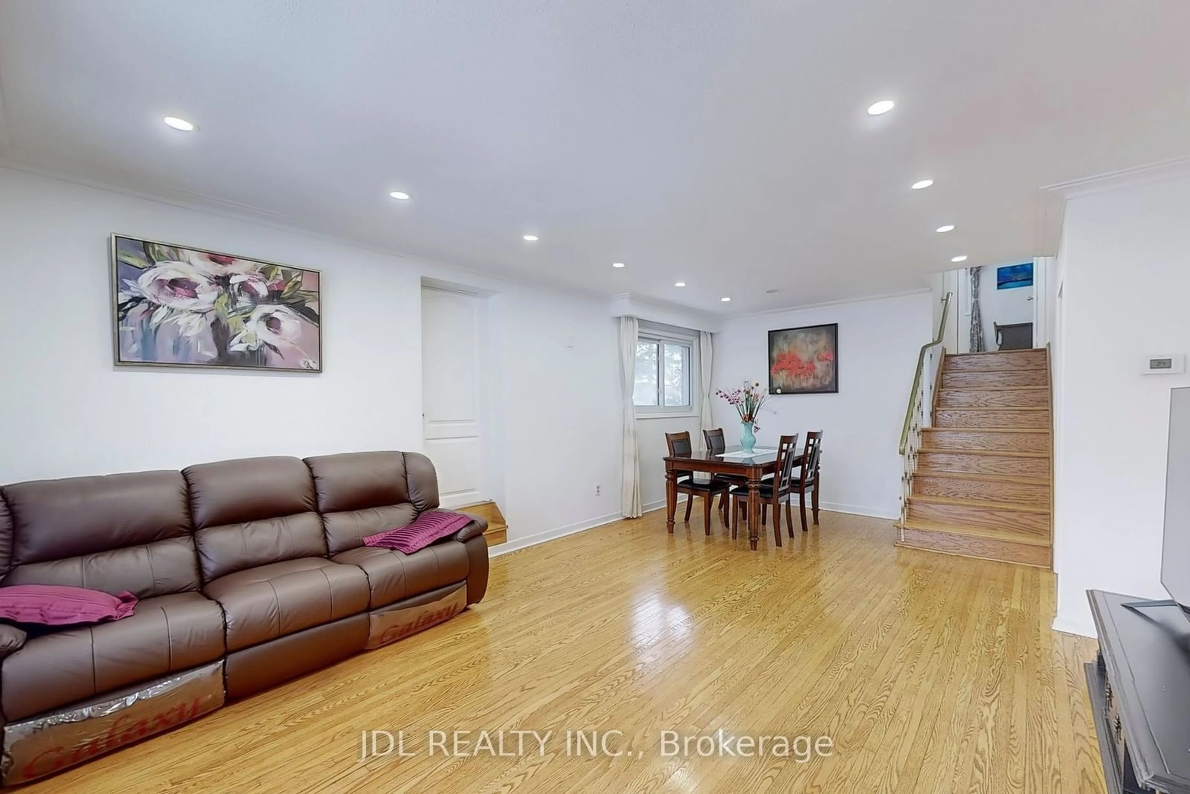 Living room with furniture, wood/laminate floor for 18 Allanford Rd, Toronto Ontario M1T 2N1